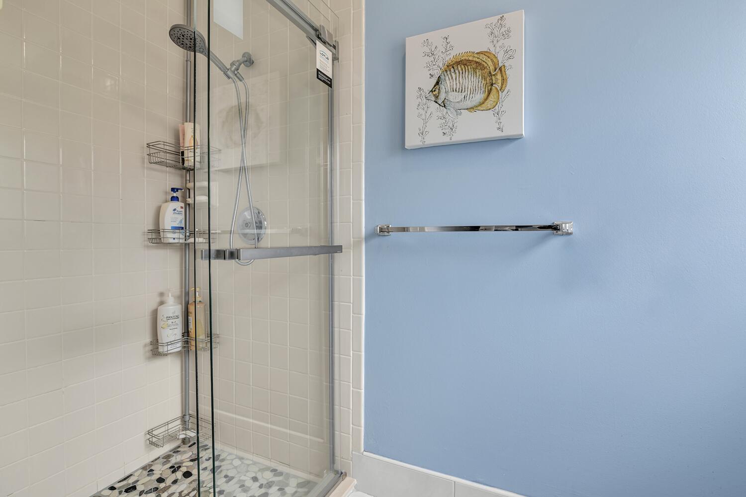 6335 Hitchin Post Way Delray Beach, FL 33484 - Photo 13 of 33 a bathroom with a shower and a sink