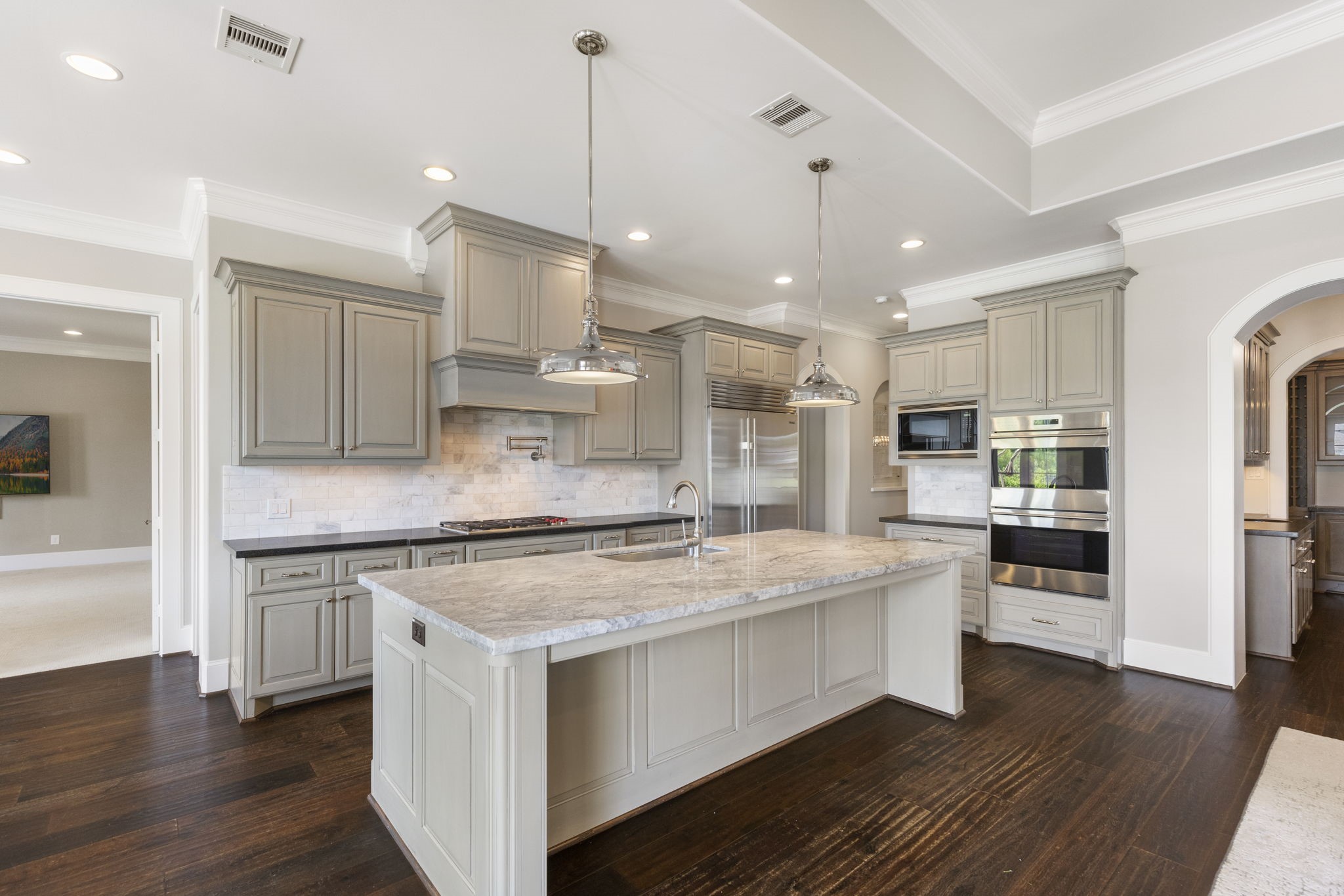6806 West Warwick Lake Lane Spring, TX 77389 - Photo 13 of 50 a kitchen with stainless steel appliances granite countertop a sink a stove and a refrigerator