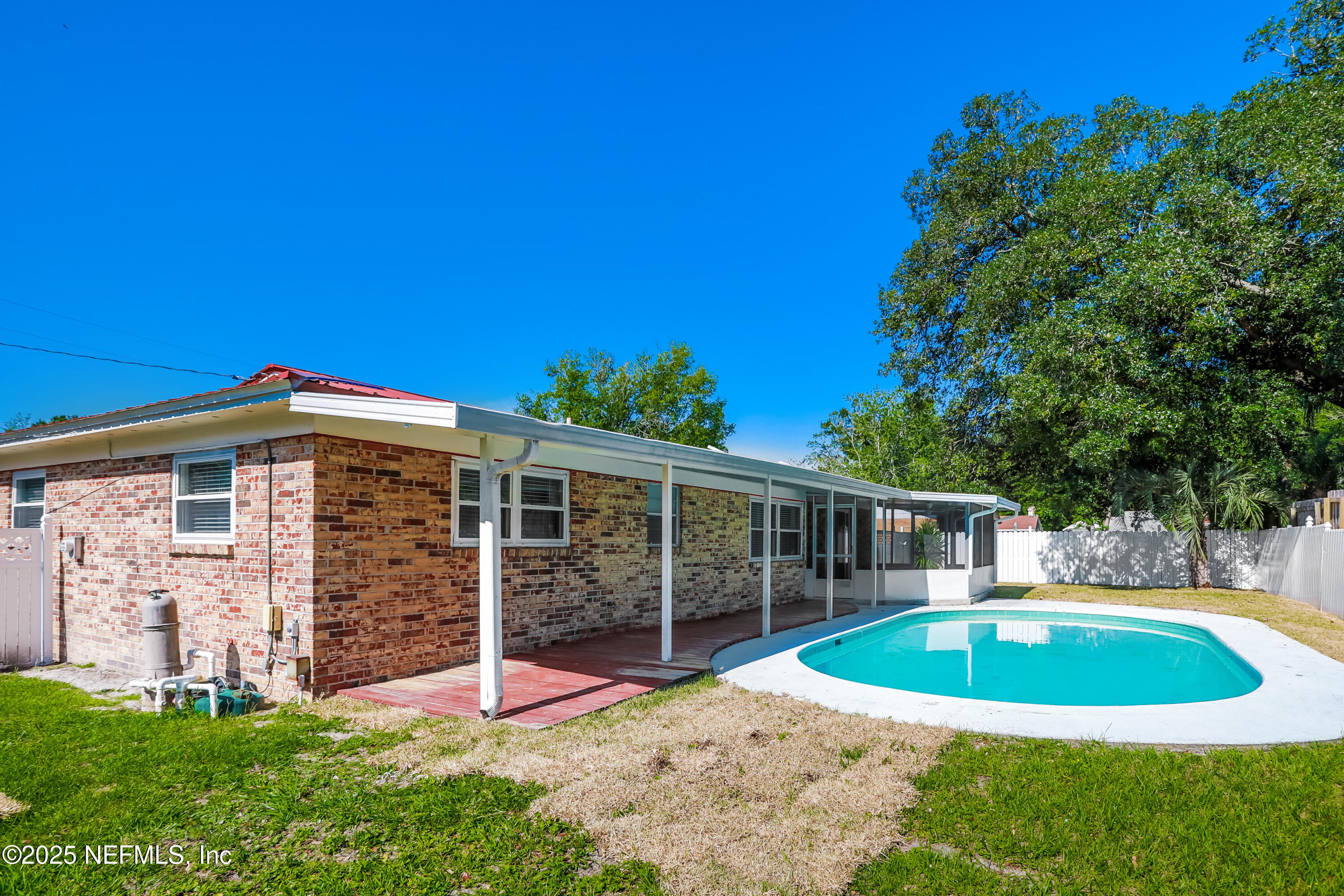 1055 Grove Park Drive Orange Park, FL 32073 - Photo 15 of 15 a view of a house with a backyard