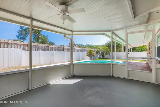 a bathroom with a large tub and shower