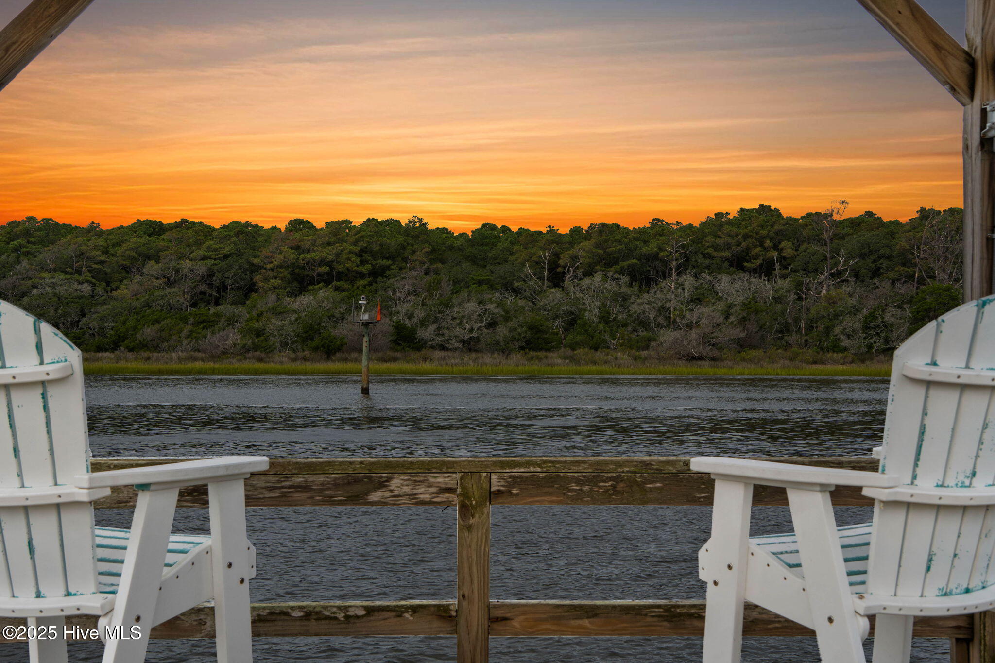 57 Craven Street Ocean Isle Beach, NC 28469 - Photo 6 of 85 Exceptional ICW-front home featuring 5 bedrooms, 5.5 baths, breathtaking water views, private dock with boat lift, and a resort-style outdoor space with pool, porches, and deck.