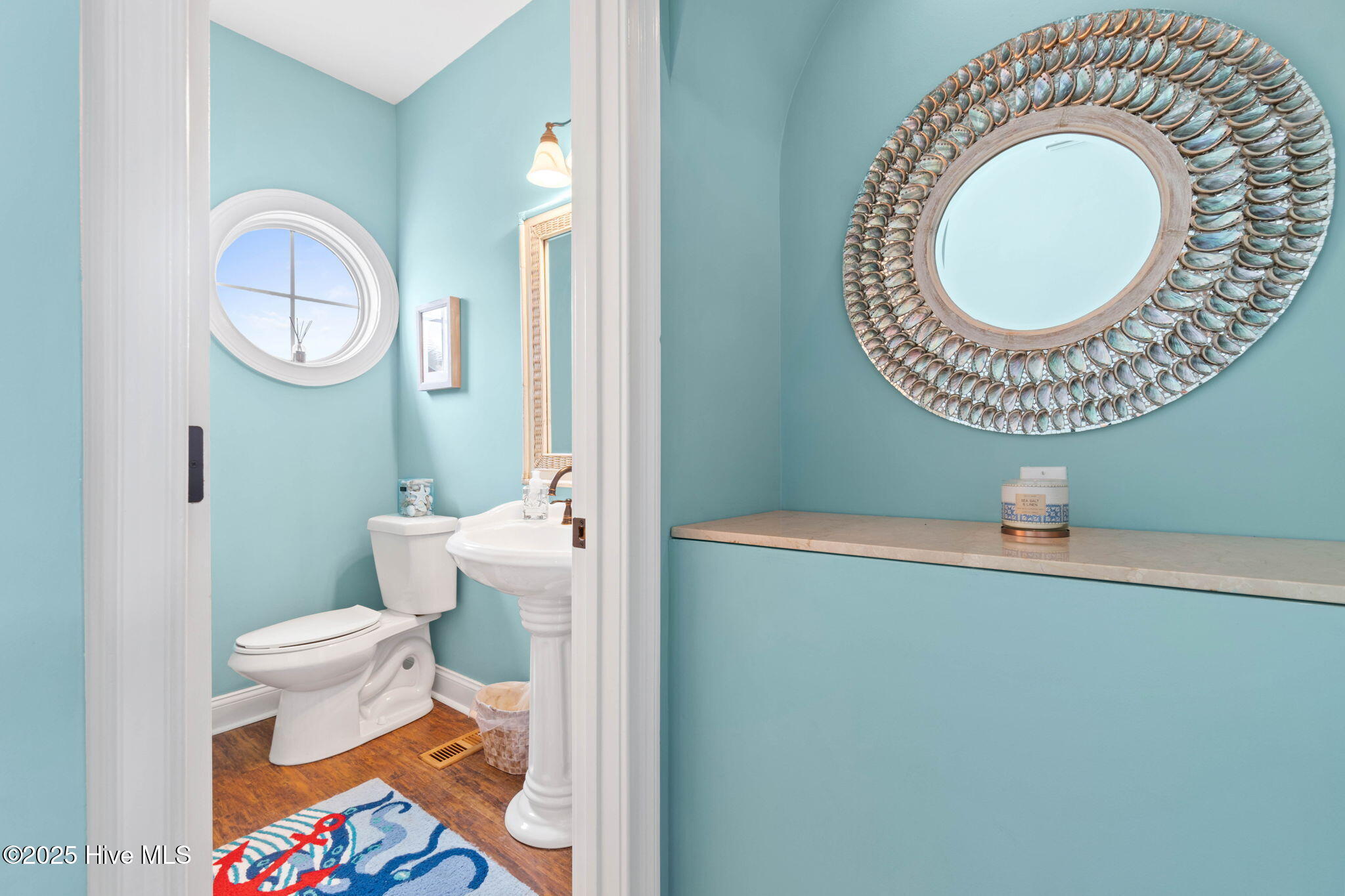 57 Craven Street Ocean Isle Beach, NC 28469 - Photo 10 of 85 Exceptional ICW-front home featuring 5 bedrooms, 5.5 baths, breathtaking water views, private dock with boat lift, and a resort-style outdoor space with pool, porches, and deck.