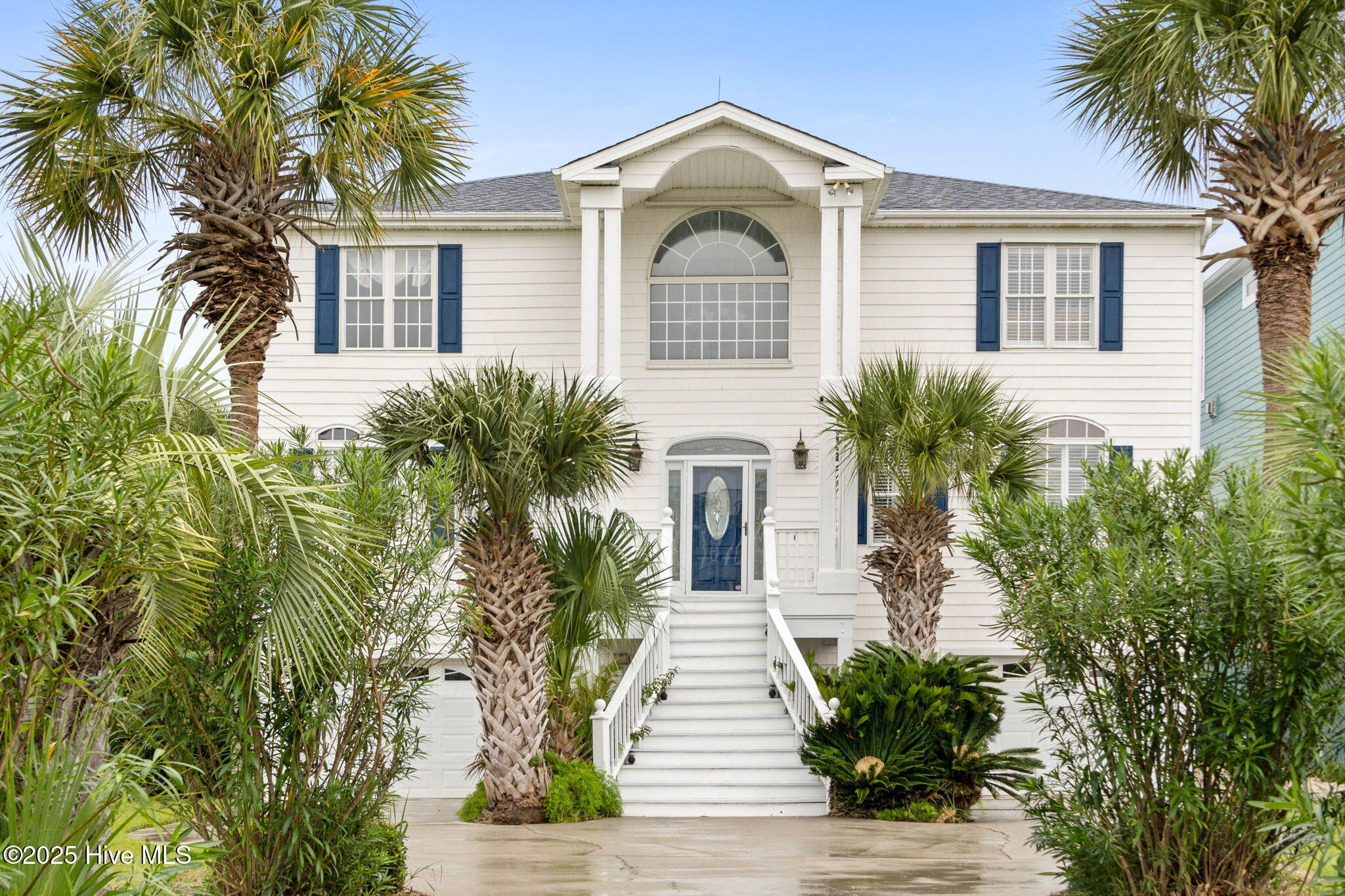 57 Craven Street Ocean Isle Beach, NC 28469 - Photo 1 of 85 Exceptional ICW-front home featuring 5 bedrooms, 5.5 baths, breathtaking water views, private dock with boat lift, and a resort-style outdoor space with pool, porches, and deck.