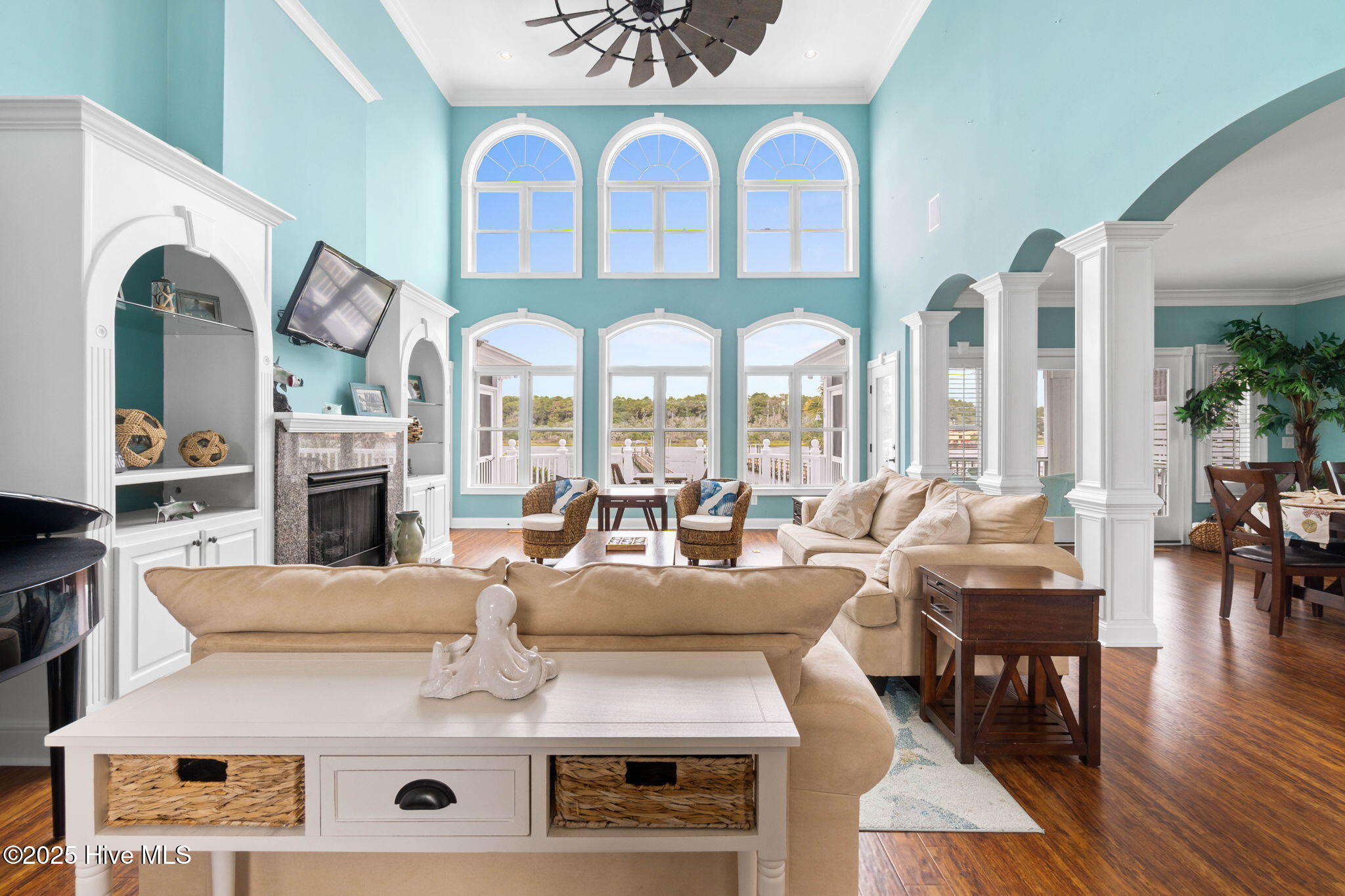 57 Craven Street Ocean Isle Beach, NC 28469 - Photo 12 of 85 Exceptional ICW-front home featuring 5 bedrooms, 5.5 baths, breathtaking water views, private dock with boat lift, and a resort-style outdoor space with pool, porches, and deck.