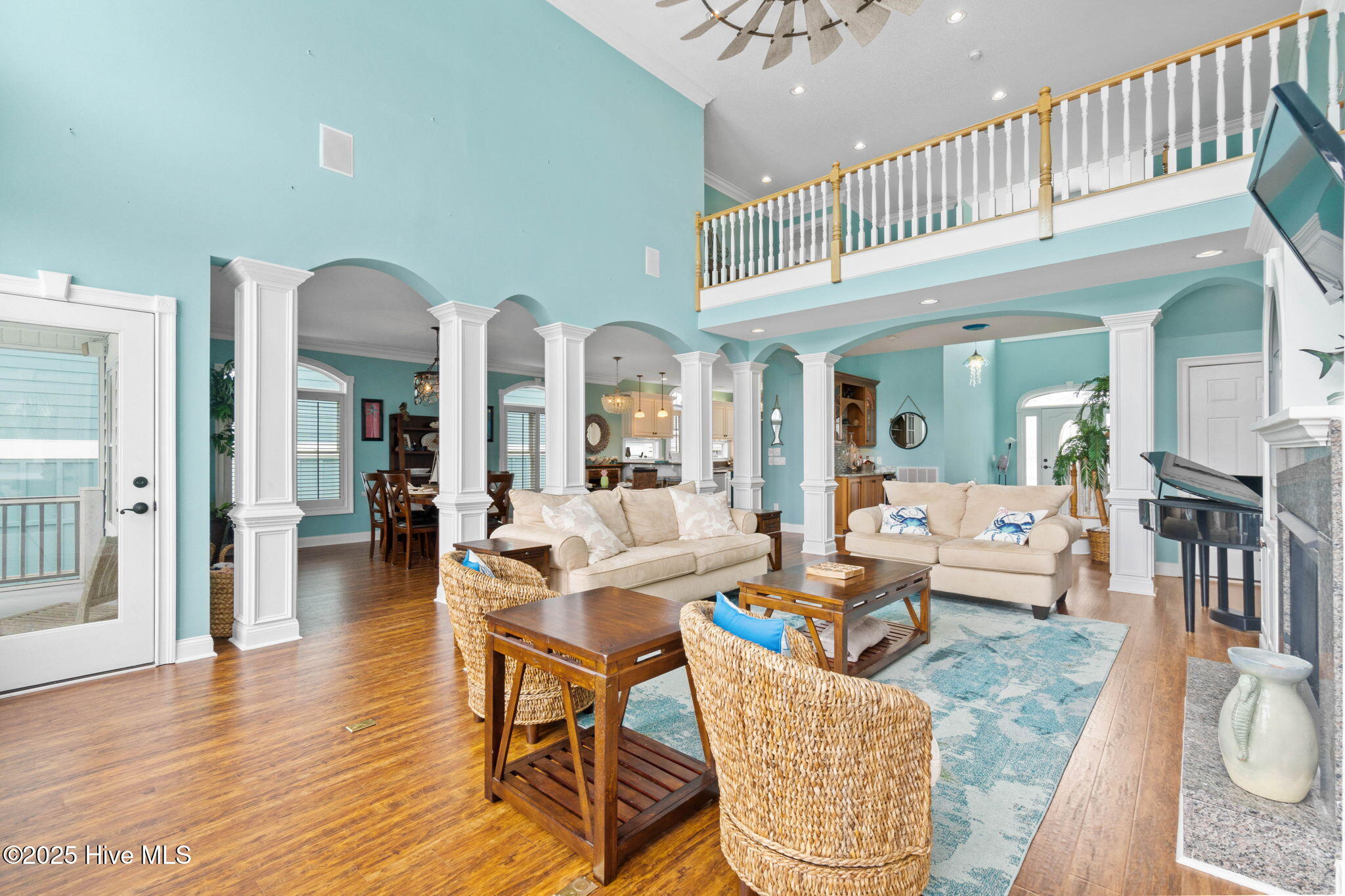 57 Craven Street Ocean Isle Beach, NC 28469 - Photo 14 of 85 Exceptional ICW-front home featuring 5 bedrooms, 5.5 baths, breathtaking water views, private dock with boat lift, and a resort-style outdoor space with pool, porches, and deck.
