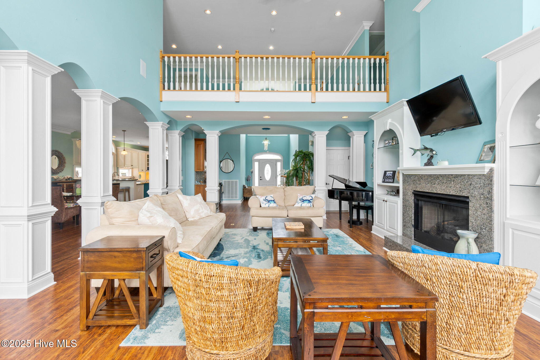 57 Craven Street Ocean Isle Beach, NC 28469 - Photo 16 of 85 Exceptional ICW-front home featuring 5 bedrooms, 5.5 baths, breathtaking water views, private dock with boat lift, and a resort-style outdoor space with pool, porches, and deck.