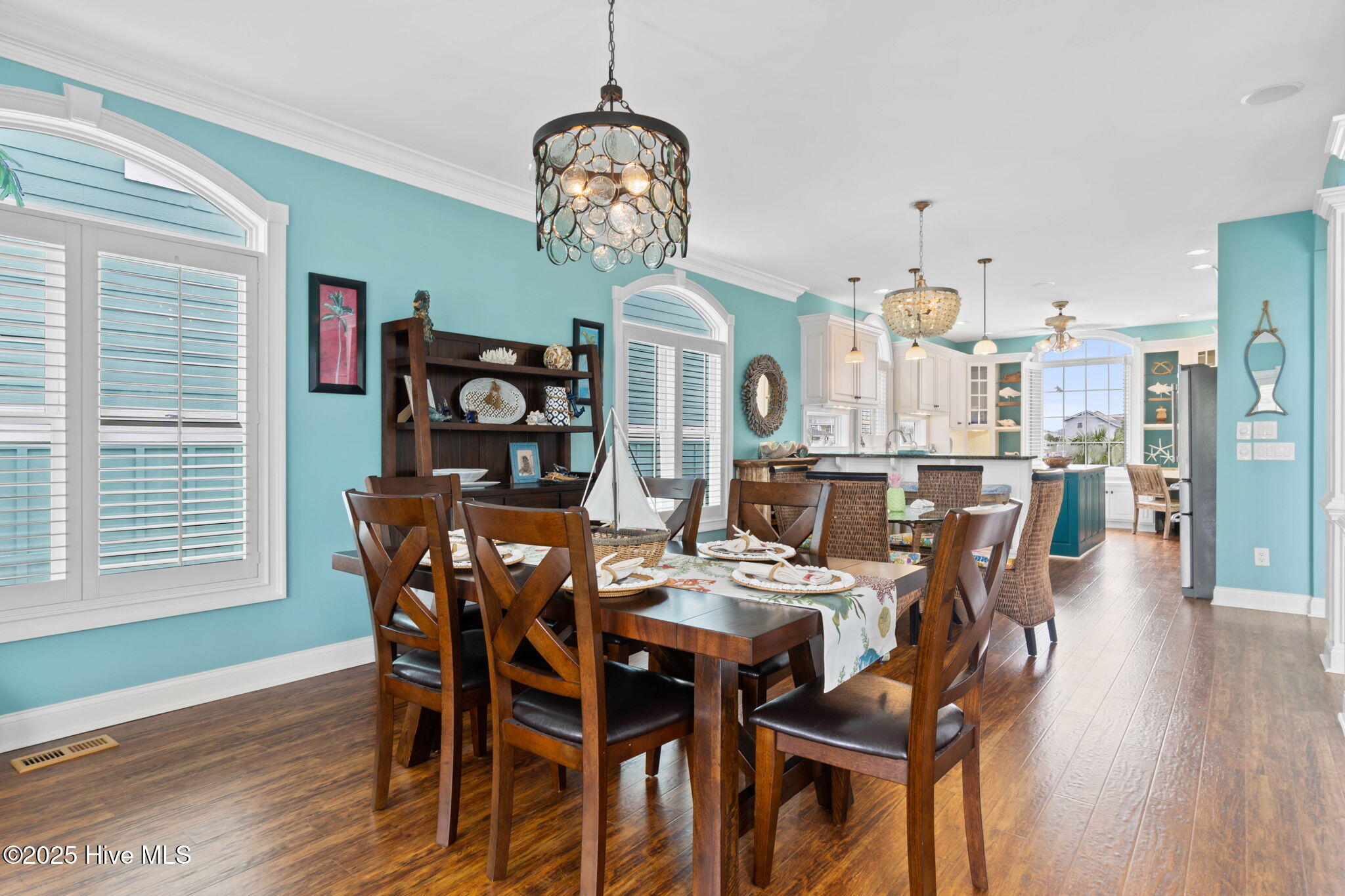 57 Craven Street Ocean Isle Beach, NC 28469 - Photo 18 of 85 Exceptional ICW-front home featuring 5 bedrooms, 5.5 baths, breathtaking water views, private dock with boat lift, and a resort-style outdoor space with pool, porches, and deck.