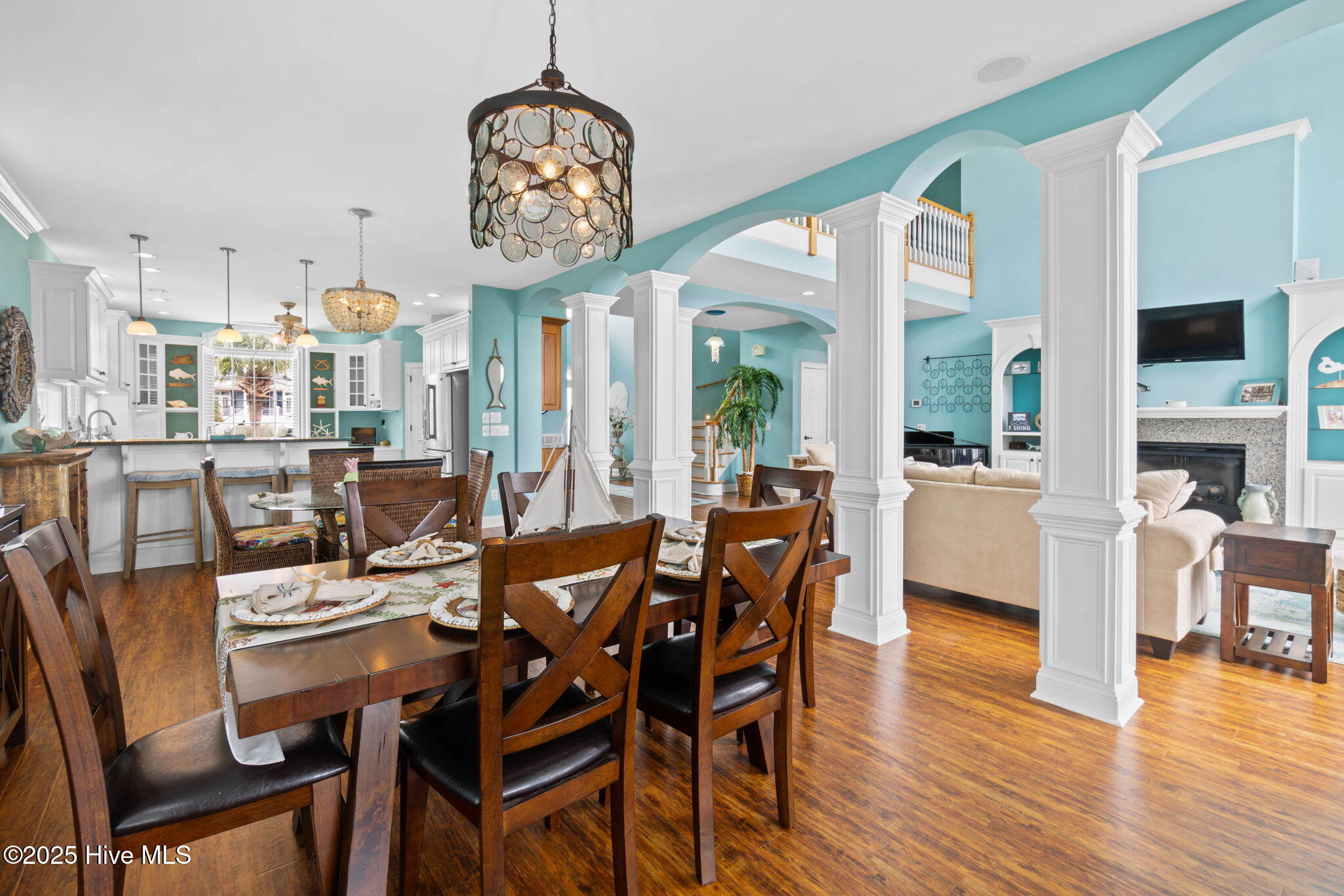 57 Craven Street Ocean Isle Beach, NC 28469 - Photo 19 of 85 Exceptional ICW-front home featuring 5 bedrooms, 5.5 baths, breathtaking water views, private dock with boat lift, and a resort-style outdoor space with pool, porches, and deck.
