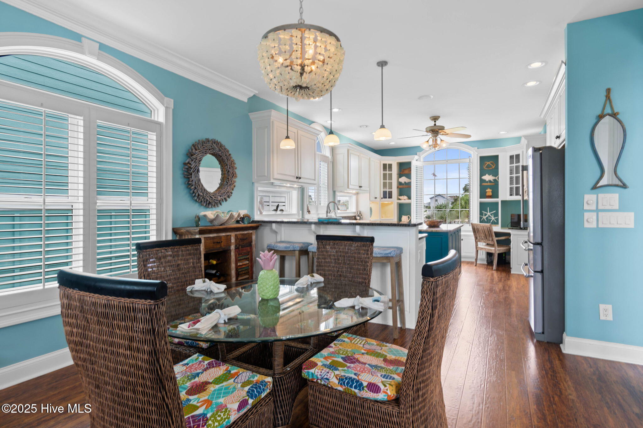 57 Craven Street Ocean Isle Beach, NC 28469 - Photo 20 of 85 Exceptional ICW-front home featuring 5 bedrooms, 5.5 baths, breathtaking water views, private dock with boat lift, and a resort-style outdoor space with pool, porches, and deck.