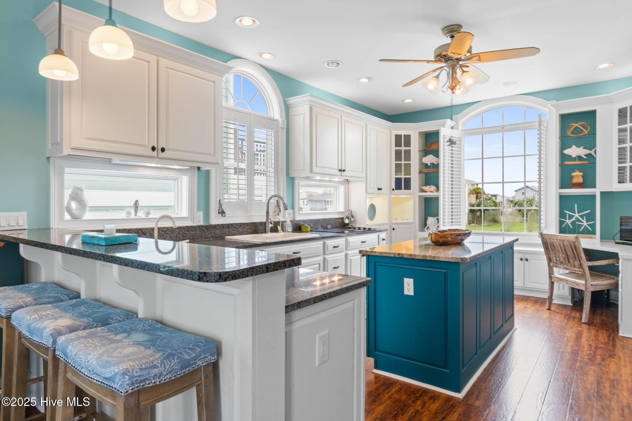 57 Craven Street Ocean Isle Beach, NC 28469 - Photo 21 of 85 Exceptional ICW-front home featuring 5 bedrooms, 5.5 baths, breathtaking water views, private dock with boat lift, and a resort-style outdoor space with pool, porches, and deck.