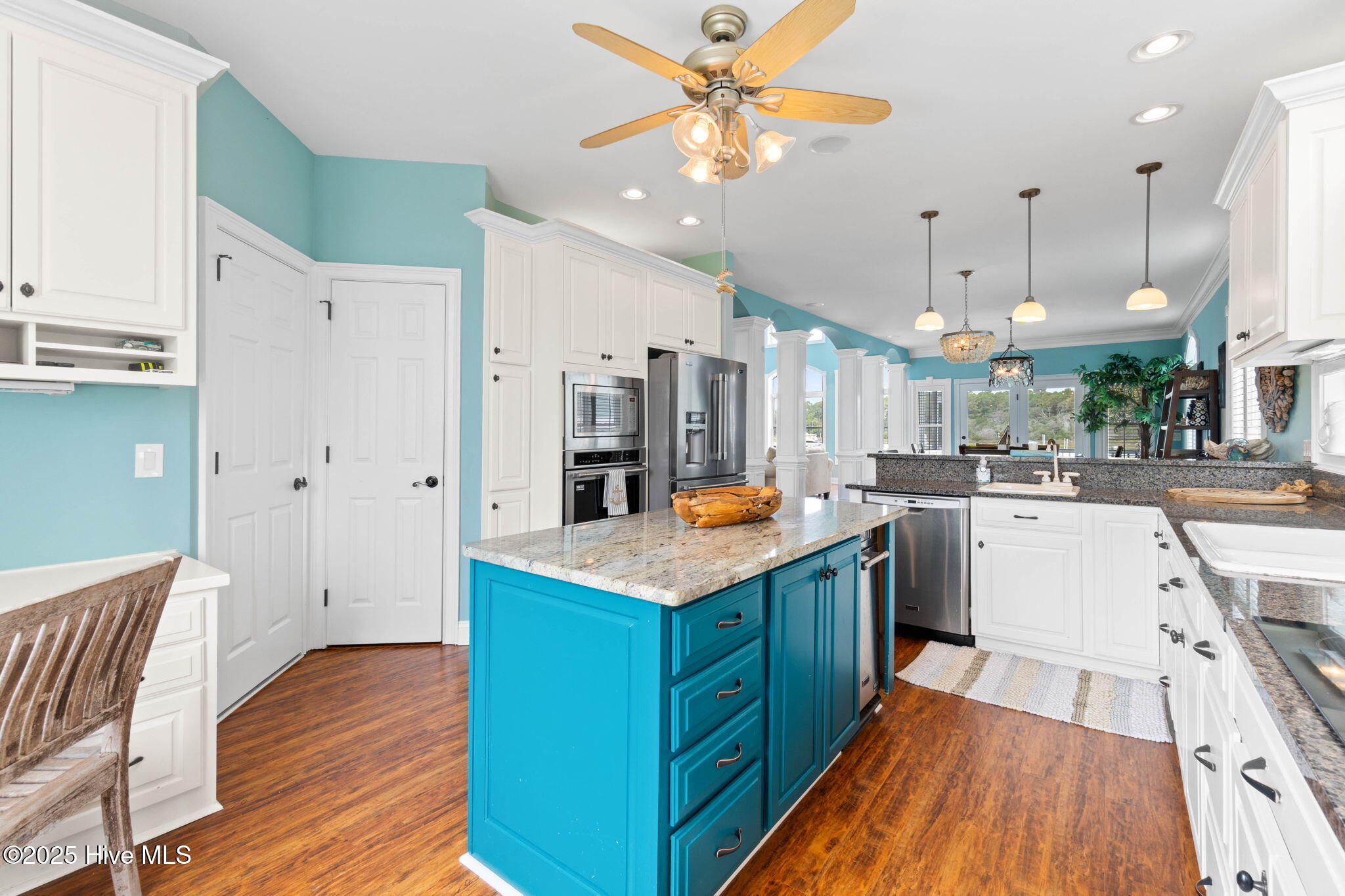 57 Craven Street Ocean Isle Beach, NC 28469 - Photo 23 of 85 Exceptional ICW-front home featuring 5 bedrooms, 5.5 baths, breathtaking water views, private dock with boat lift, and a resort-style outdoor space with pool, porches, and deck.