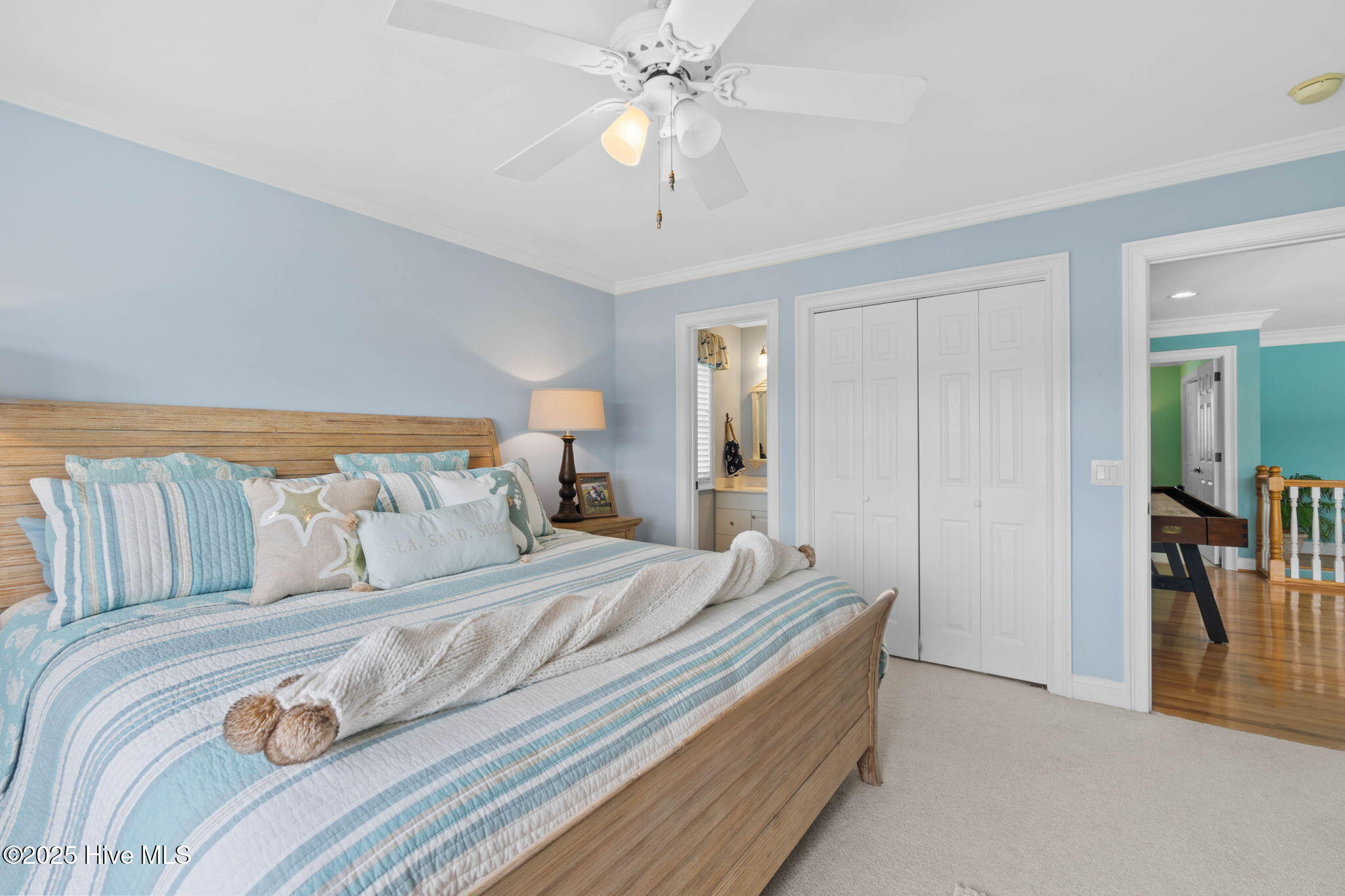 57 Craven Street Ocean Isle Beach, NC 28469 - Photo 38 of 85 Exceptional ICW-front home featuring 5 bedrooms, 5.5 baths, breathtaking water views, private dock with boat lift, and a resort-style outdoor space with pool, porches, and deck.