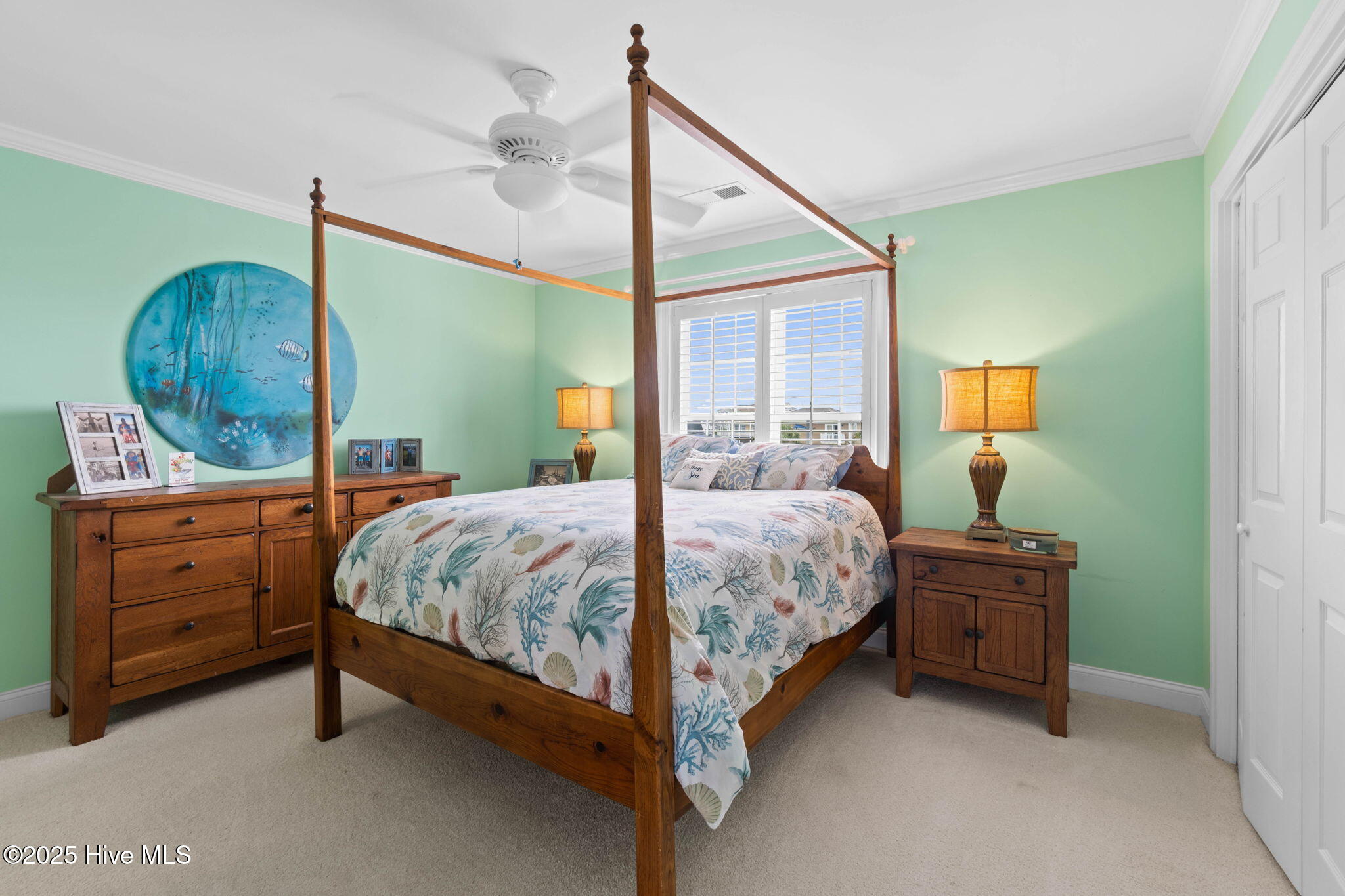 57 Craven Street Ocean Isle Beach, NC 28469 - Photo 42 of 85 Exceptional ICW-front home featuring 5 bedrooms, 5.5 baths, breathtaking water views, private dock with boat lift, and a resort-style outdoor space with pool, porches, and deck.