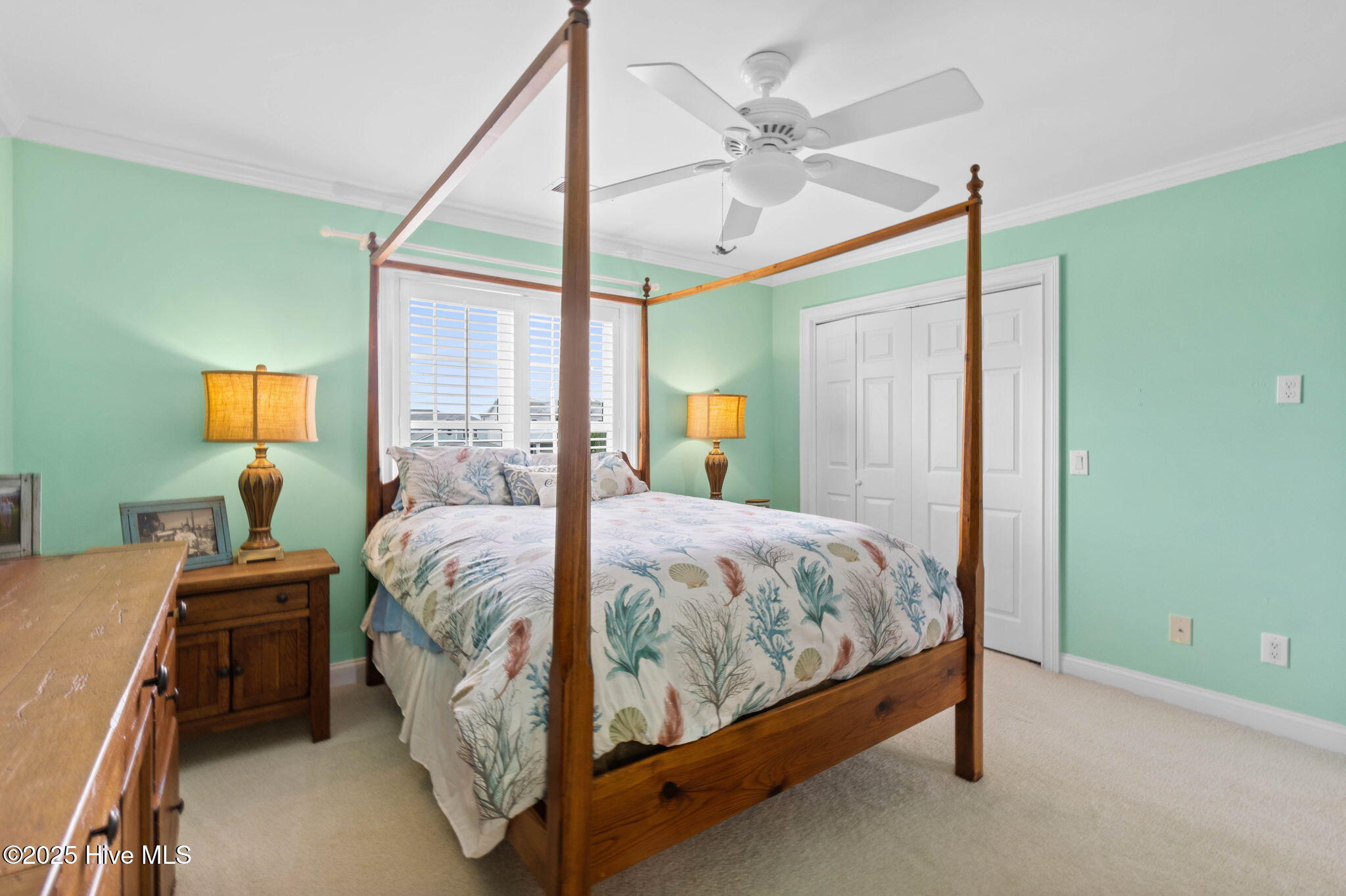 57 Craven Street Ocean Isle Beach, NC 28469 - Photo 43 of 85 Exceptional ICW-front home featuring 5 bedrooms, 5.5 baths, breathtaking water views, private dock with boat lift, and a resort-style outdoor space with pool, porches, and deck.