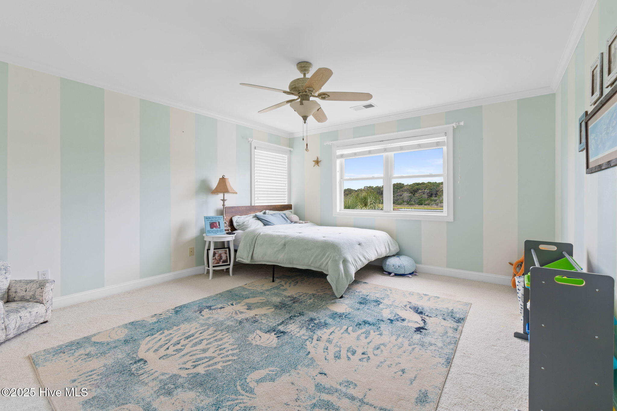 57 Craven Street Ocean Isle Beach, NC 28469 - Photo 45 of 85 Exceptional ICW-front home featuring 5 bedrooms, 5.5 baths, breathtaking water views, private dock with boat lift, and a resort-style outdoor space with pool, porches, and deck.