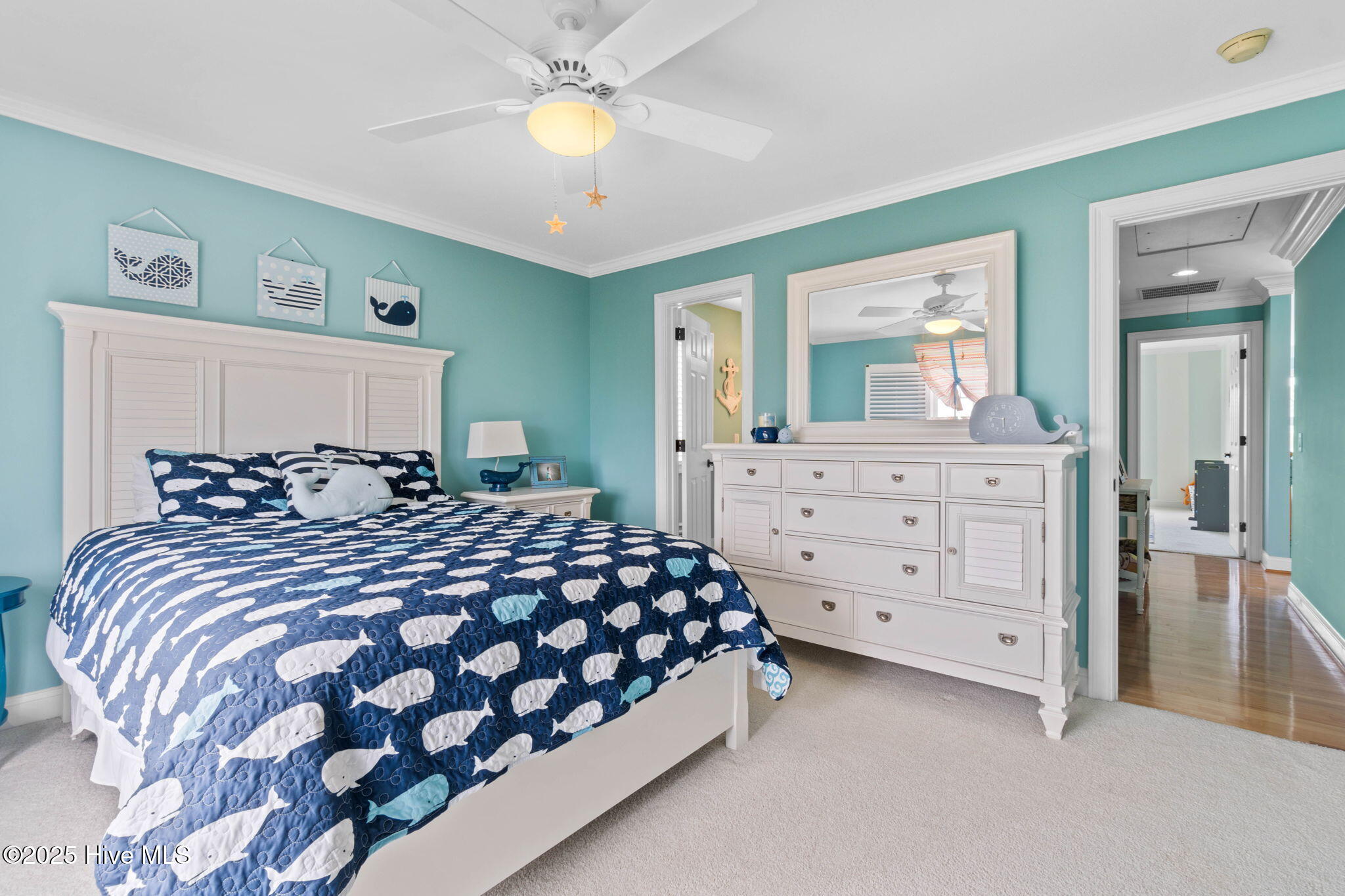 57 Craven Street Ocean Isle Beach, NC 28469 - Photo 50 of 85 Exceptional ICW-front home featuring 5 bedrooms, 5.5 baths, breathtaking water views, private dock with boat lift, and a resort-style outdoor space with pool, porches, and deck.