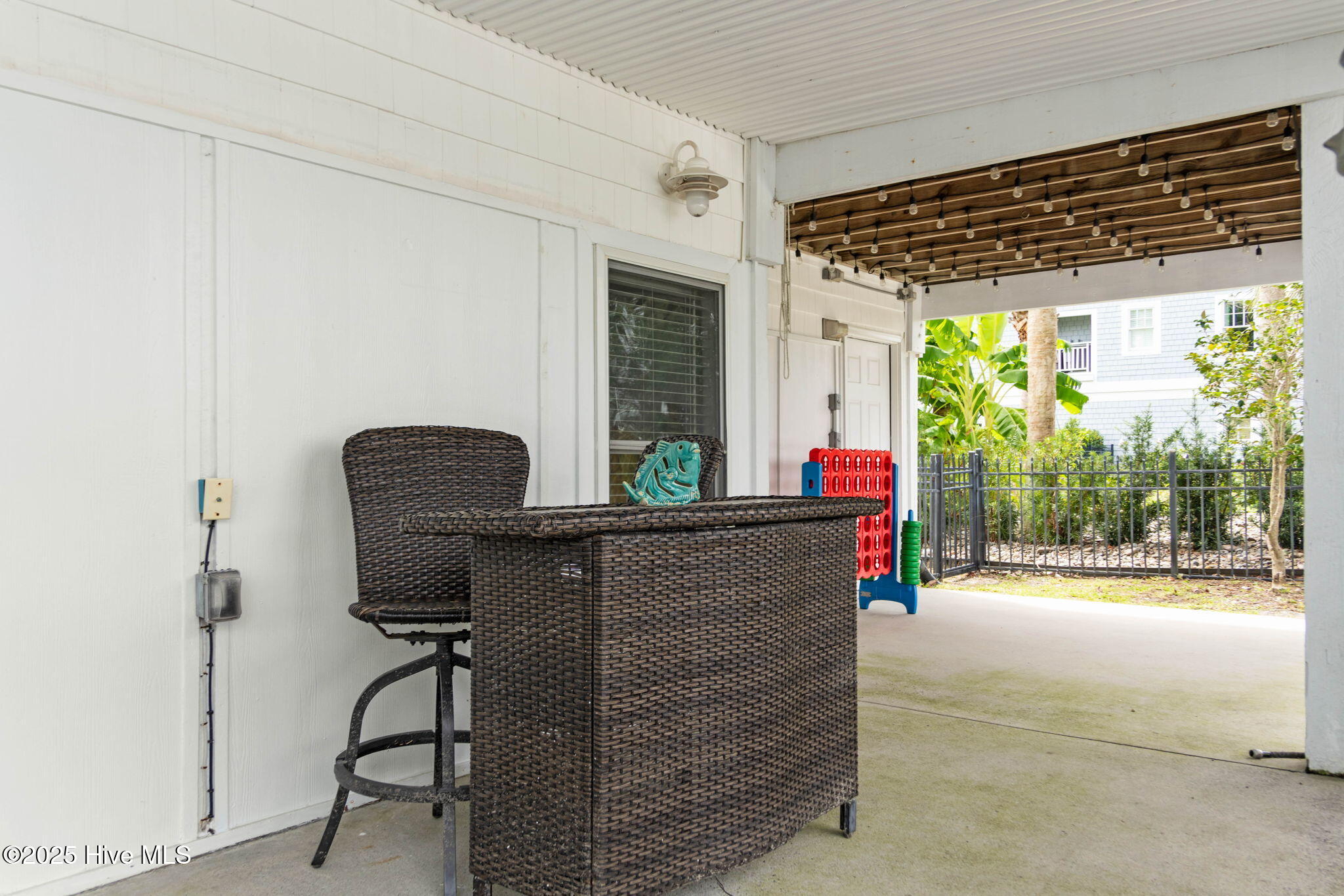 57 Craven Street Ocean Isle Beach, NC 28469 - Photo 54 of 85 Exceptional ICW-front home featuring 5 bedrooms, 5.5 baths, breathtaking water views, private dock with boat lift, and a resort-style outdoor space with pool, porches, and deck.