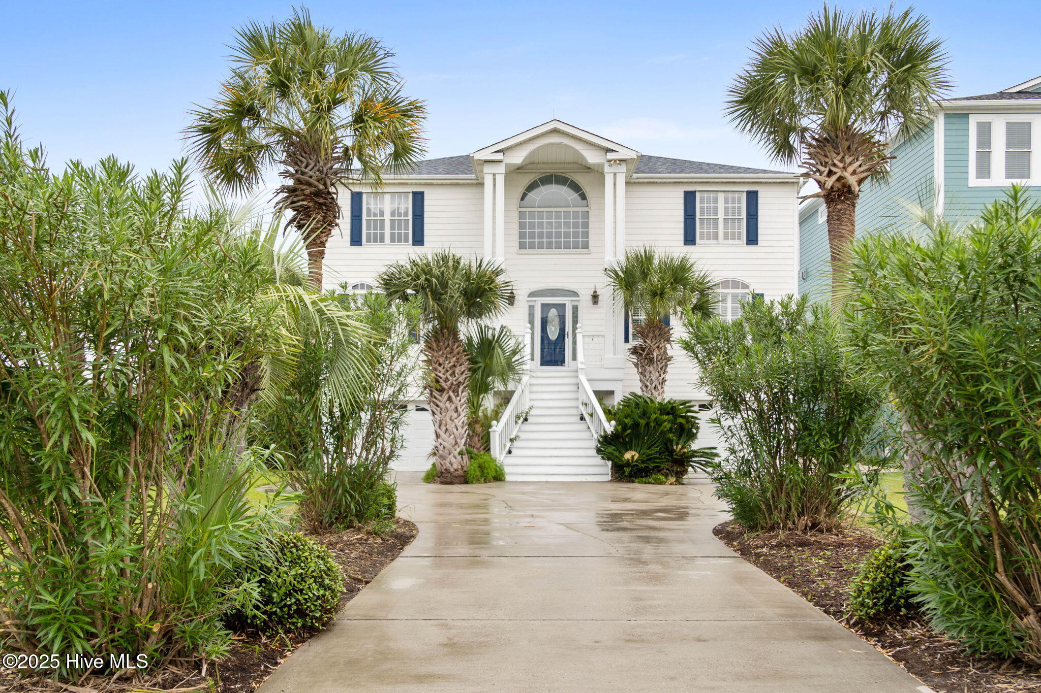 57 Craven Street Ocean Isle Beach, NC 28469 - Photo 64 of 85 Exceptional ICW-front home featuring 5 bedrooms, 5.5 baths, breathtaking water views, private dock with boat lift, and a resort-style outdoor space with pool, porches, and deck.