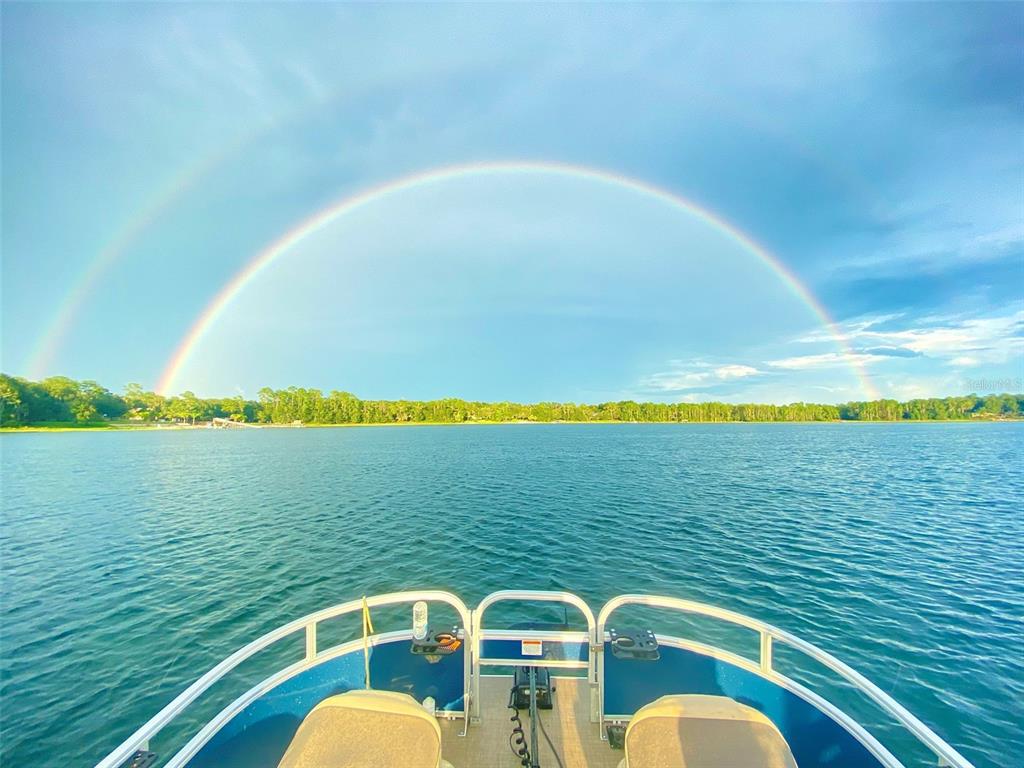 404 Grove Street Melrose, FL 32666 - Photo 13 of 50 a balcony with view of ocean and houses