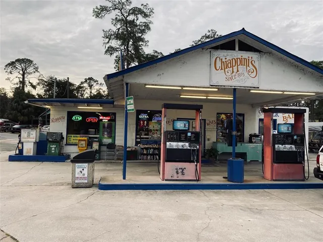 a view of a building with sitting area