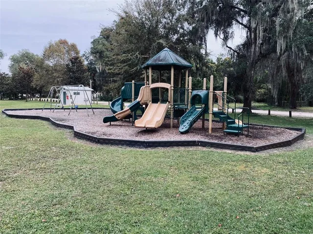 a view of a garden with a slide