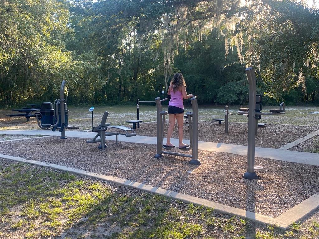 404 Grove Street Melrose, FL 32666 - Photo 38 of 50 a view of a park with swings