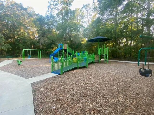 a view of a park with slide