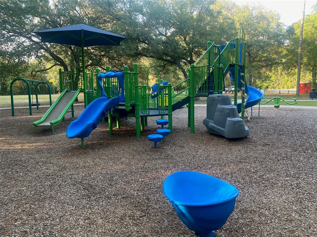 404 Grove Street Melrose, FL 32666 - Photo 40 of 50 a view of a park with slide