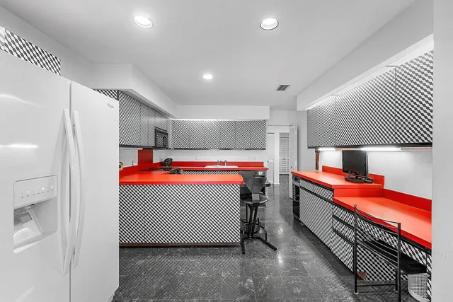 a bathroom with a sink a mirror and a shower