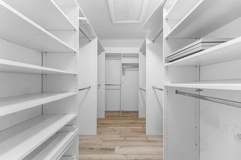 an aerial view of a house with yard swimming pool and outdoor seating