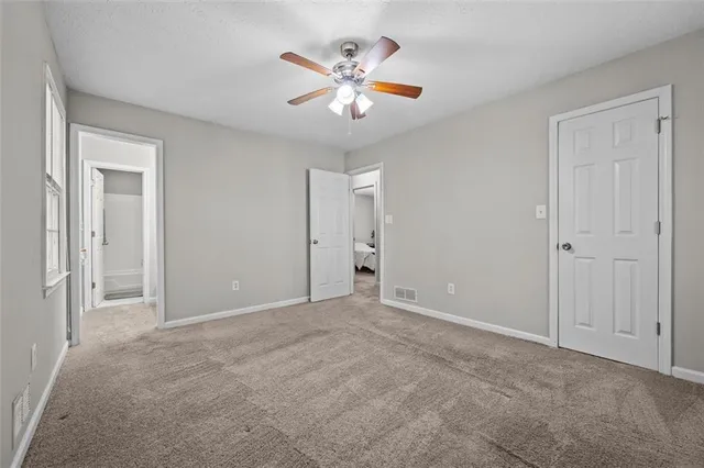 a view of an empty room with window