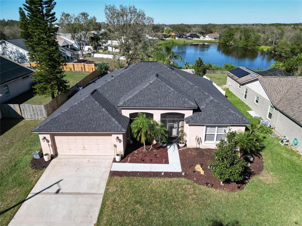 12804 Raysbrook Drive Riverview, FL 33569 - Photo 1 of 1 an aerial view of house with yard and lake view