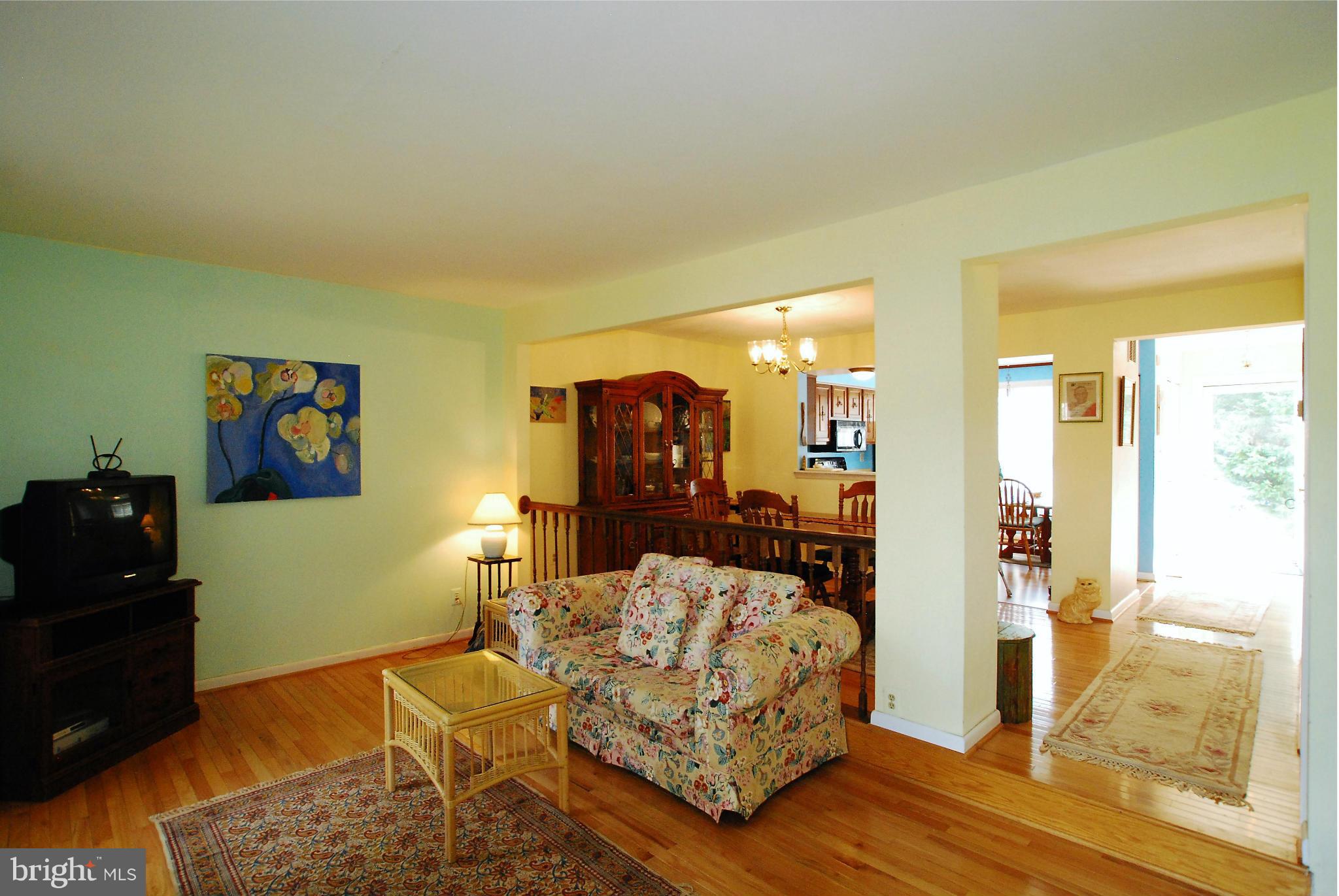 46 Robin Ridge Court Baltimore, MD 21234 - Photo 3 of 22 a living room with furniture and a wooden floor
