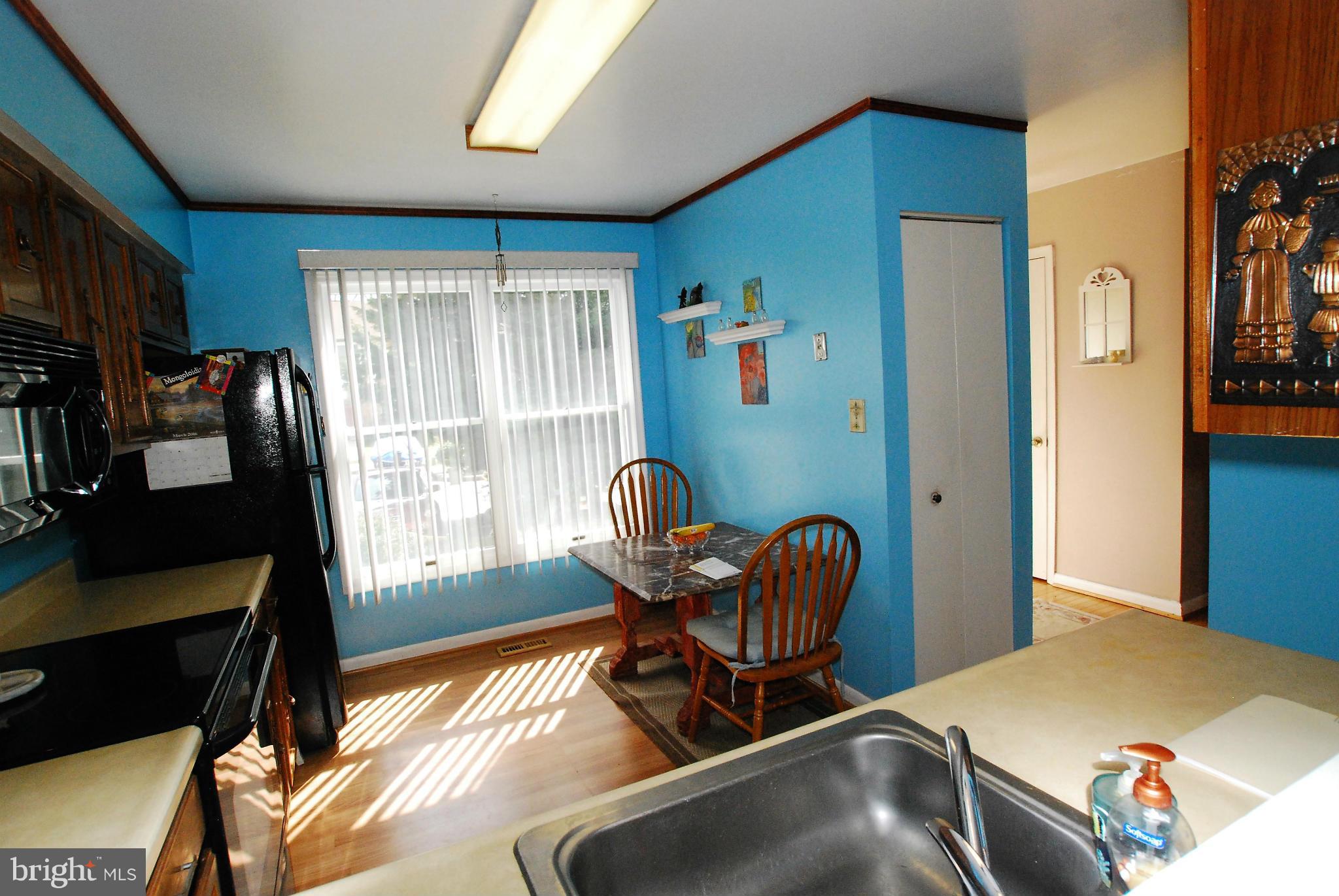 46 Robin Ridge Court Baltimore, MD 21234 - Photo 8 of 22 a living room with furniture and a window