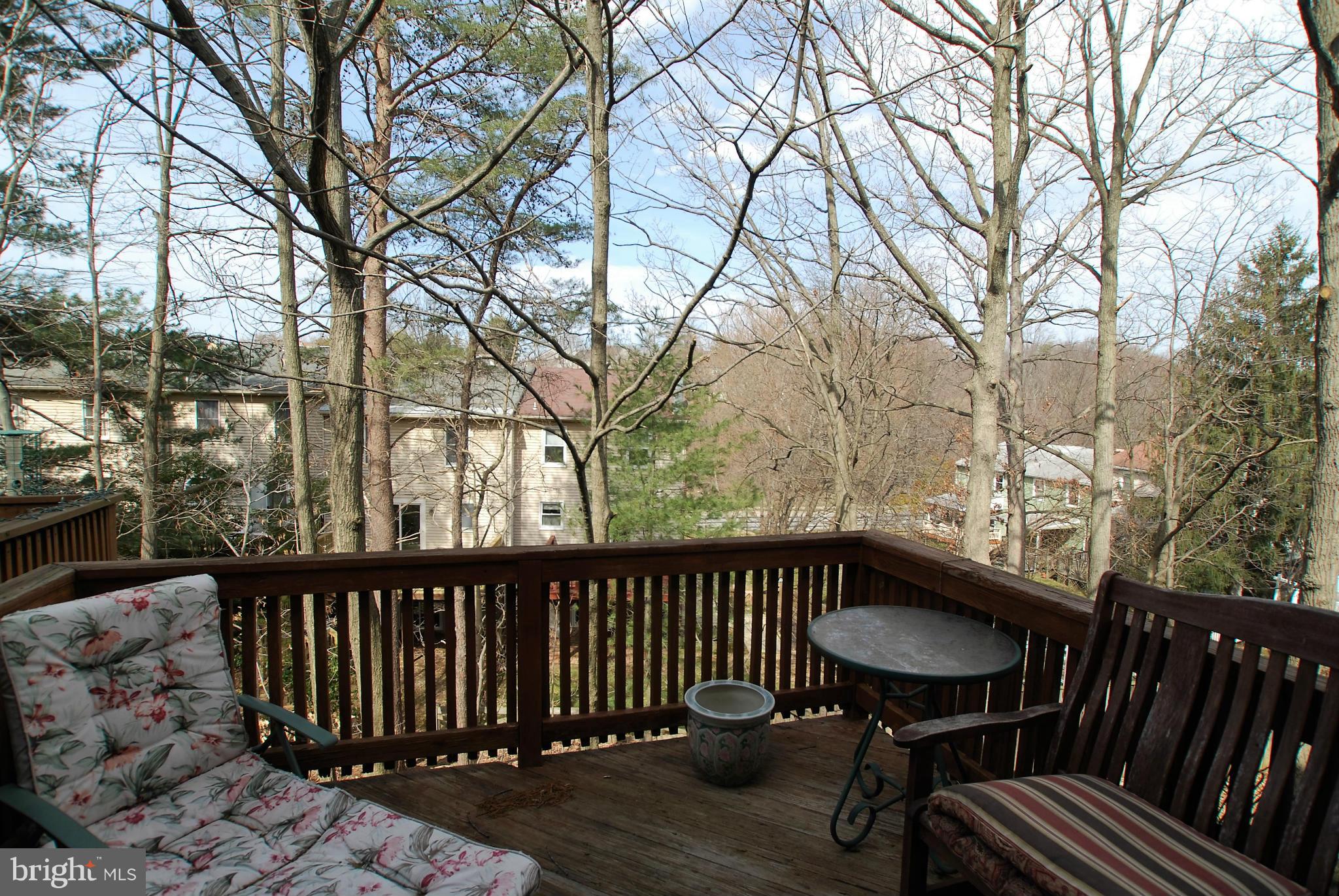 46 Robin Ridge Court Baltimore, MD 21234 - Photo 10 of 22 a view of a balcony with wooden fence