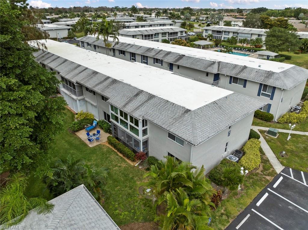 263 Candycane Lane, Unit 7 Naples, FL 34112 - Photo 32 of 50 an aerial view of a house with a yard