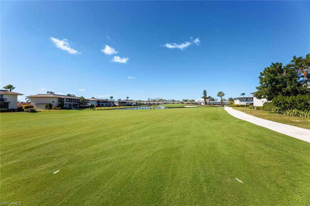 263 Candycane Lane, Unit 7 Naples, FL 34112 - Photo 34 of 50 a view of an ocean yard and outdoor space