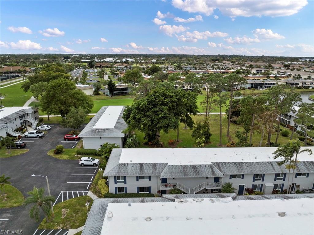 263 Candycane Lane, Unit 7 Naples, FL 34112 - Photo 39 of 50 a view of a city