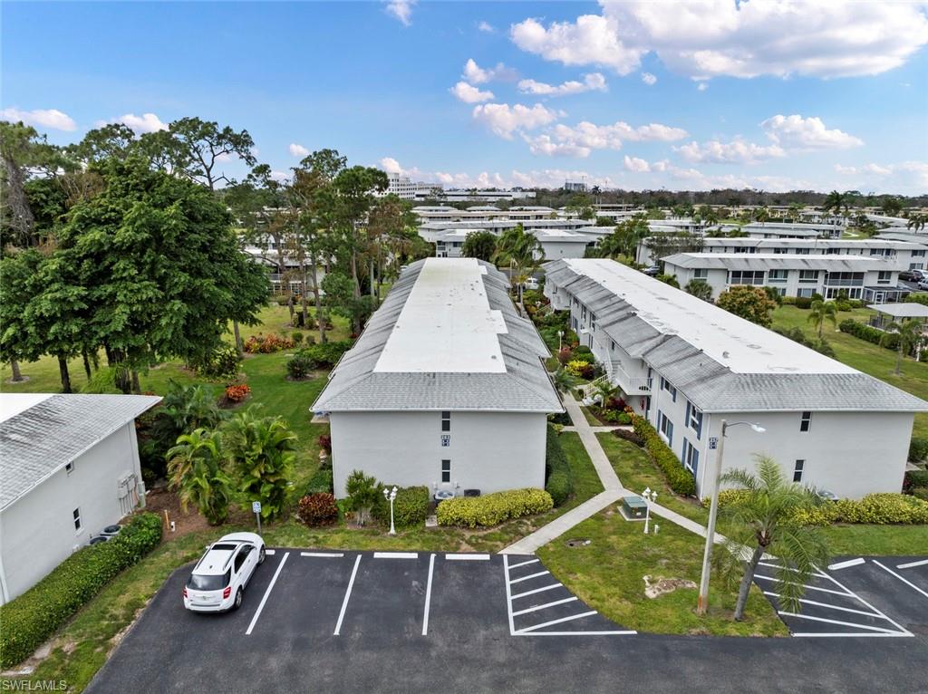 263 Candycane Lane, Unit 7 Naples, FL 34112 - Photo 41 of 50 a aerial view of a house with a yard