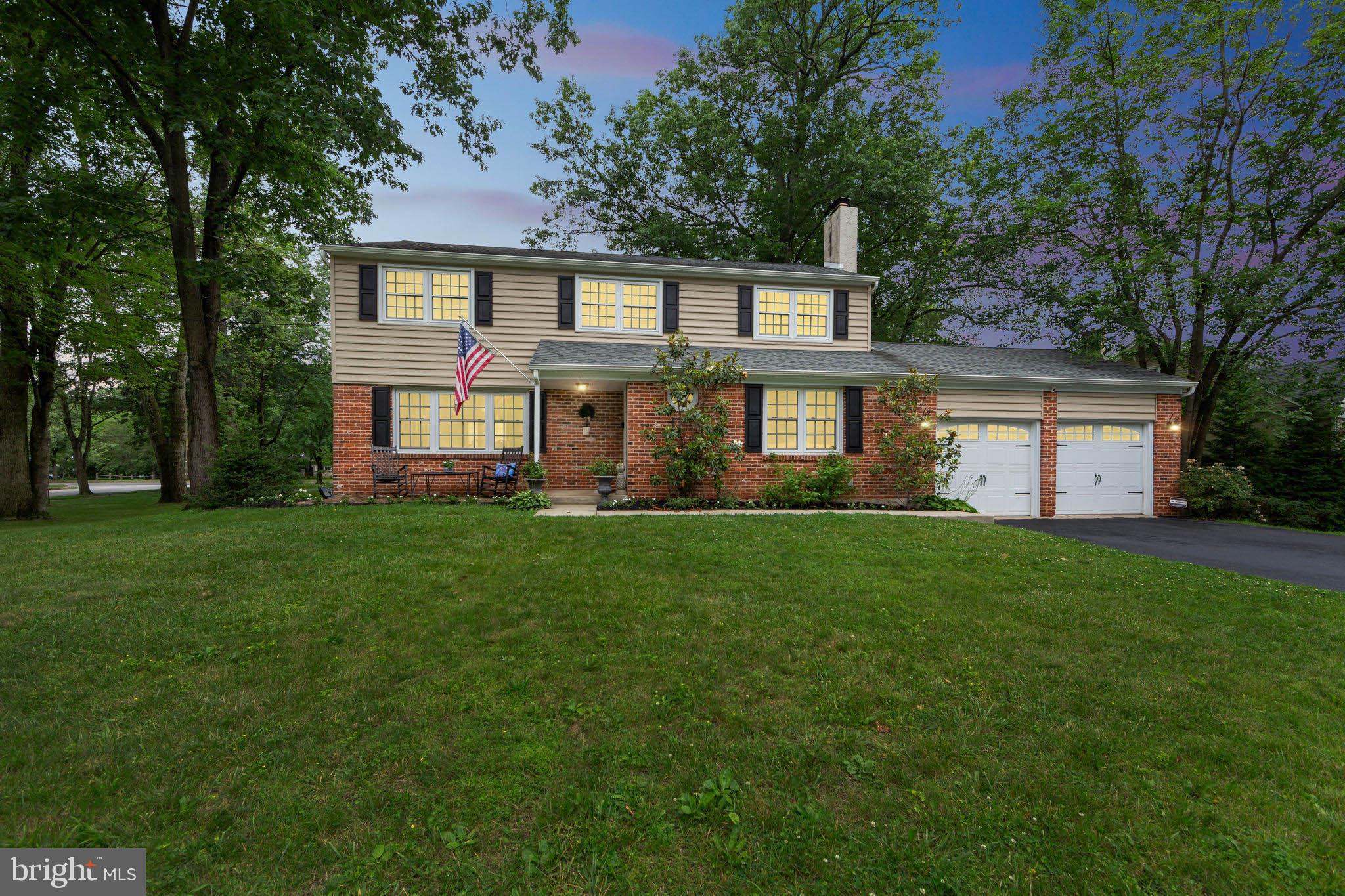 15 Oakford Road Wayne, PA 19087 - Photo 1 of 54 a front view of a house with a yard and trees