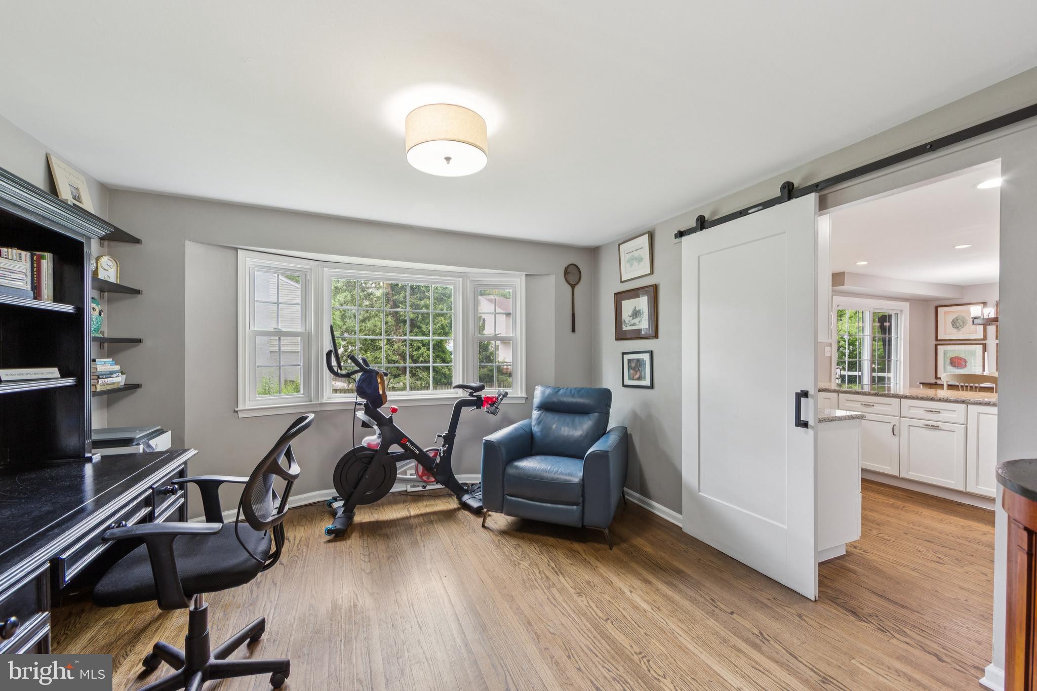 15 Oakford Road Wayne, PA 19087 - Photo 19 of 54 a view of a livingroom with workspace and a window
