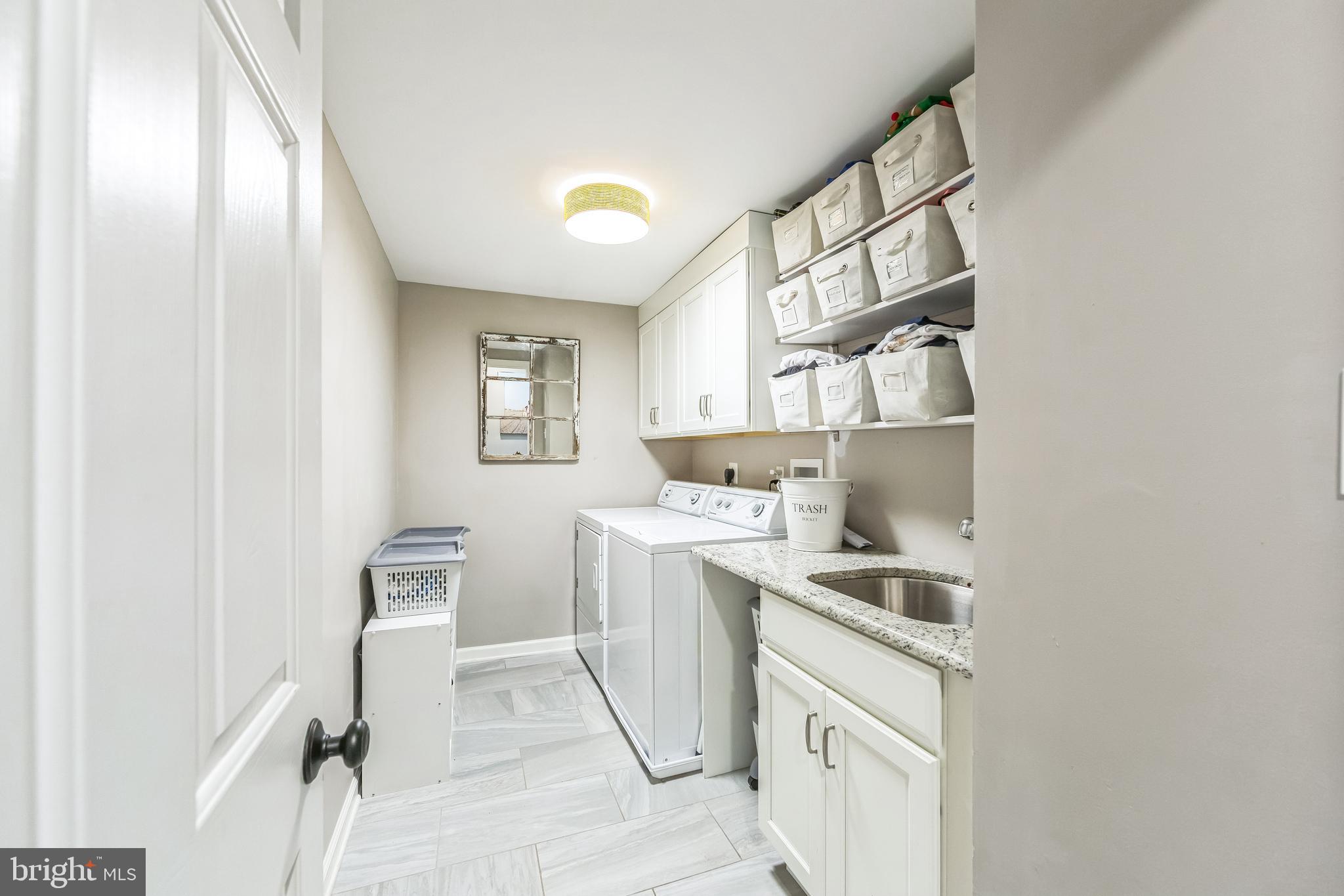 15 Oakford Road Wayne, PA 19087 - Photo 32 of 54 a kitchen with a sink cabinets and window