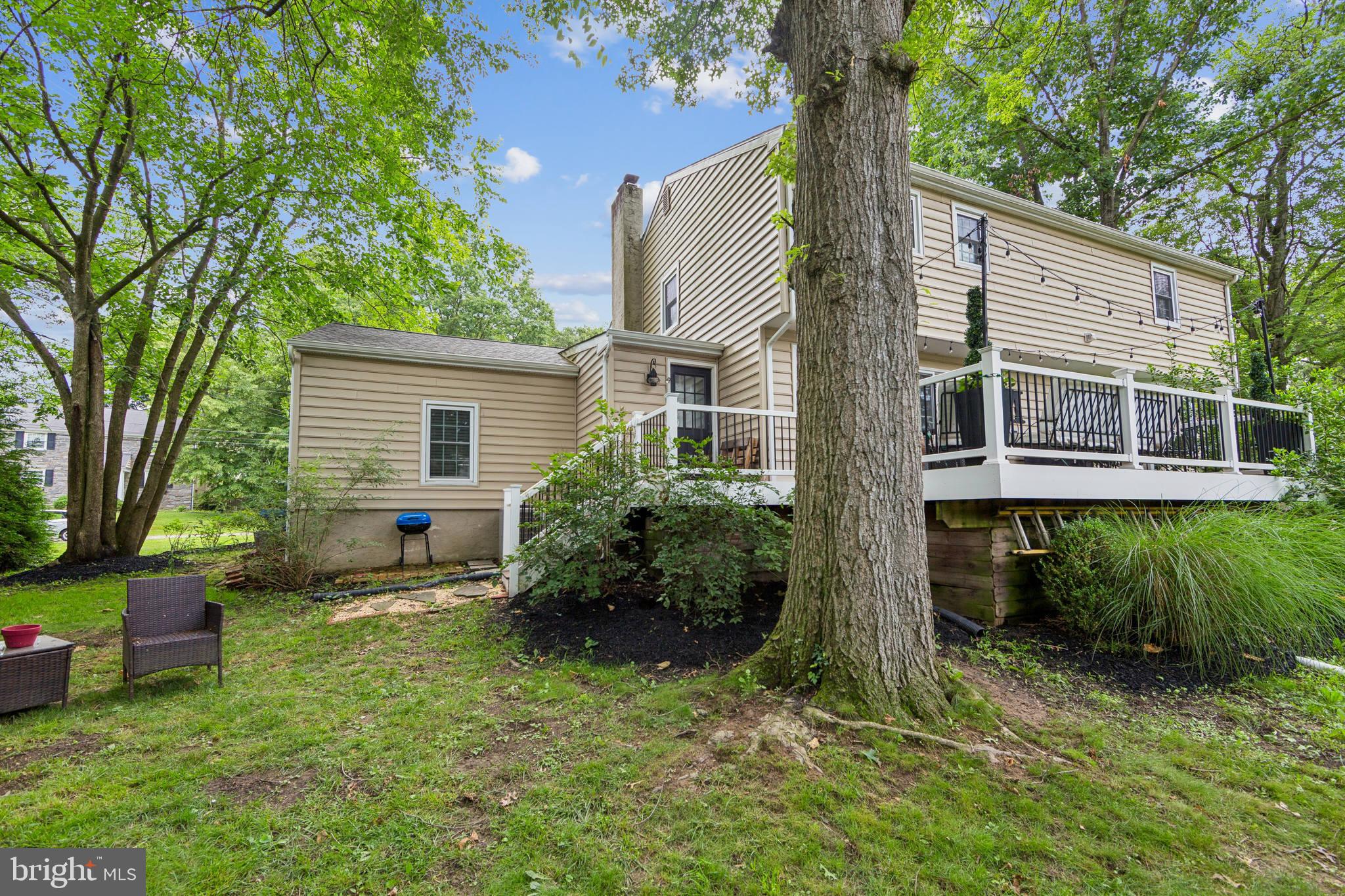 15 Oakford Road Wayne, PA 19087 - Photo 40 of 54 a view of backyard with a garden and plants