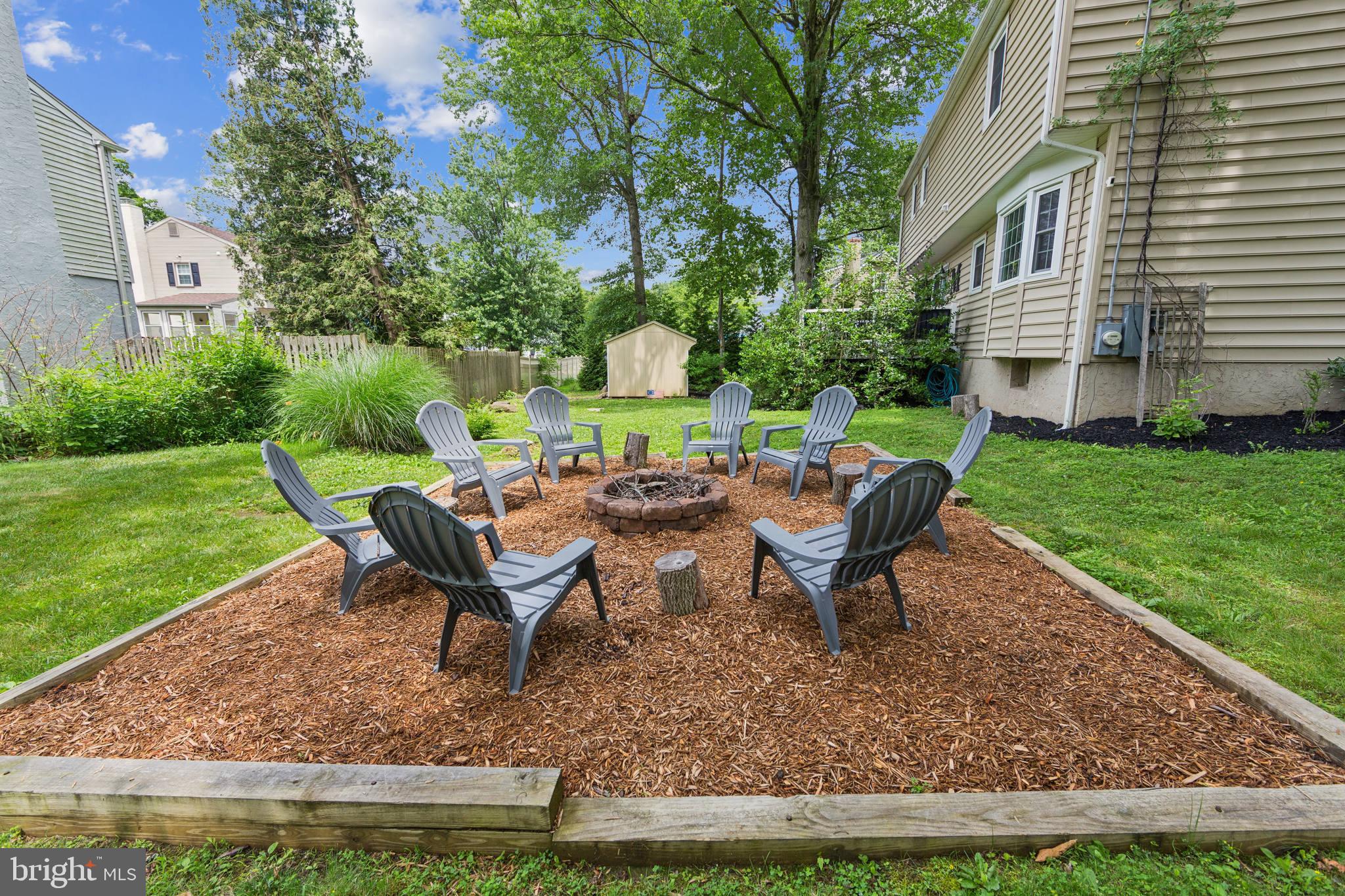 15 Oakford Road Wayne, PA 19087 - Photo 42 of 54 a view of a house with backyard porch and sitting area