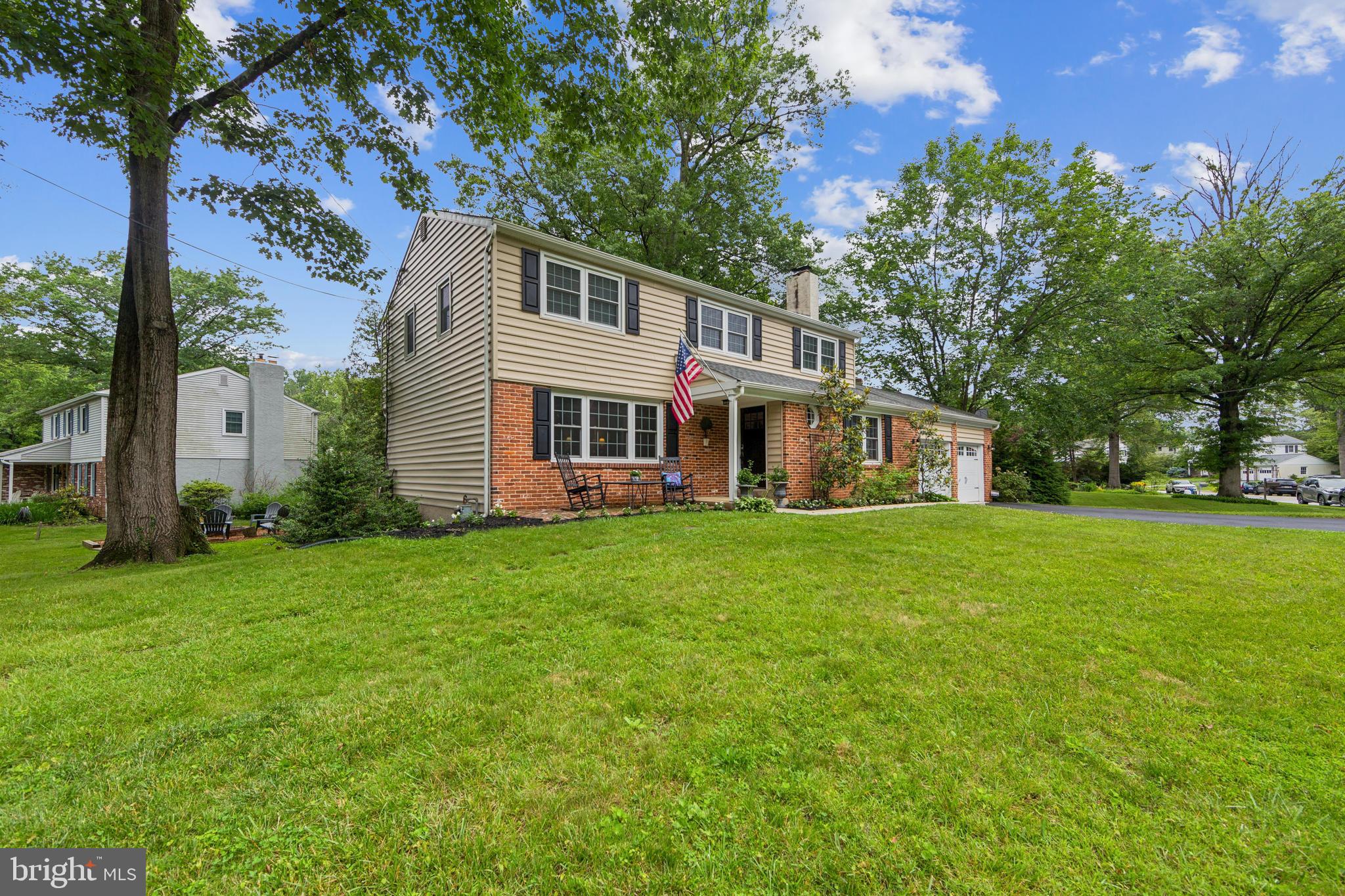 15 Oakford Road Wayne, PA 19087 - Photo 54 of 54 a front view of a house with a yard and trees