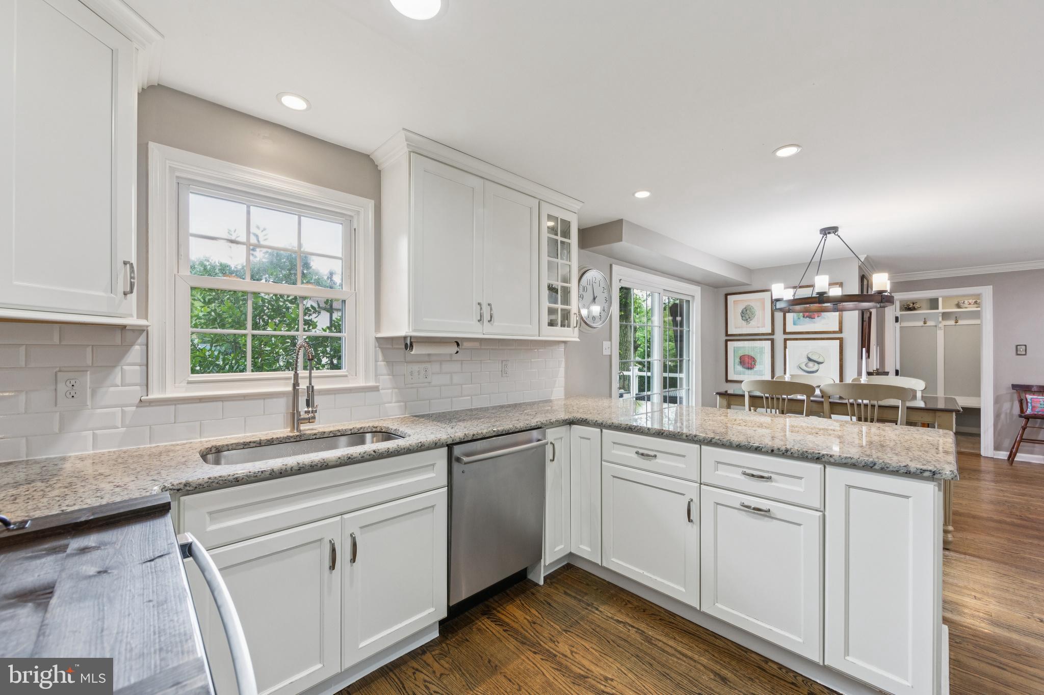 15 Oakford Road Wayne, PA 19087 - Photo 10 of 54 a kitchen with a sink white cabinets and white appliances