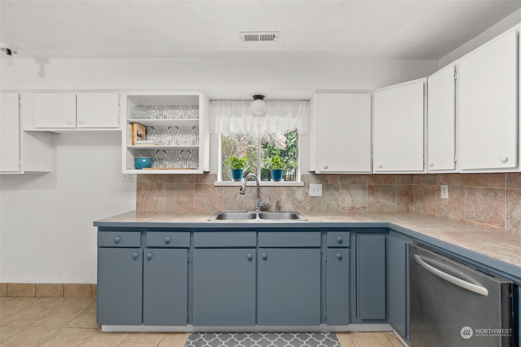1212 Long Road Centralia, WA 98531 - Photo 13 of 40 a kitchen with a sink cabinets and window
