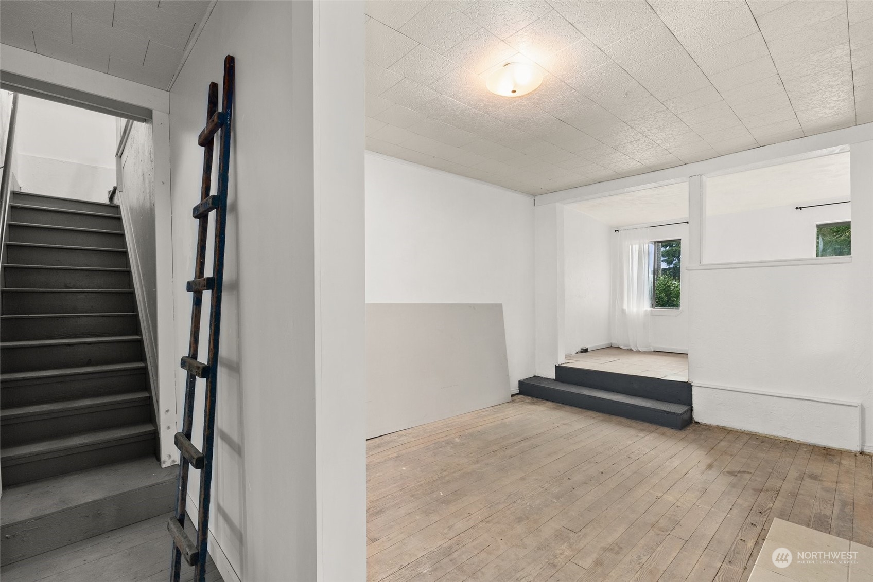 1212 Long Road Centralia, WA 98531 - Photo 15 of 40 a view of staircase and kitchen with sink