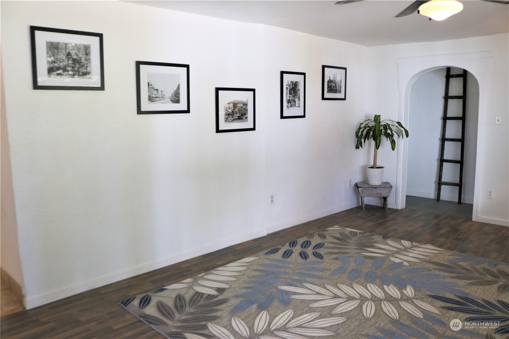 1212 Long Road Centralia, WA 98531 - Photo 33 of 40 a view of a bedroom with wooden floor and small space