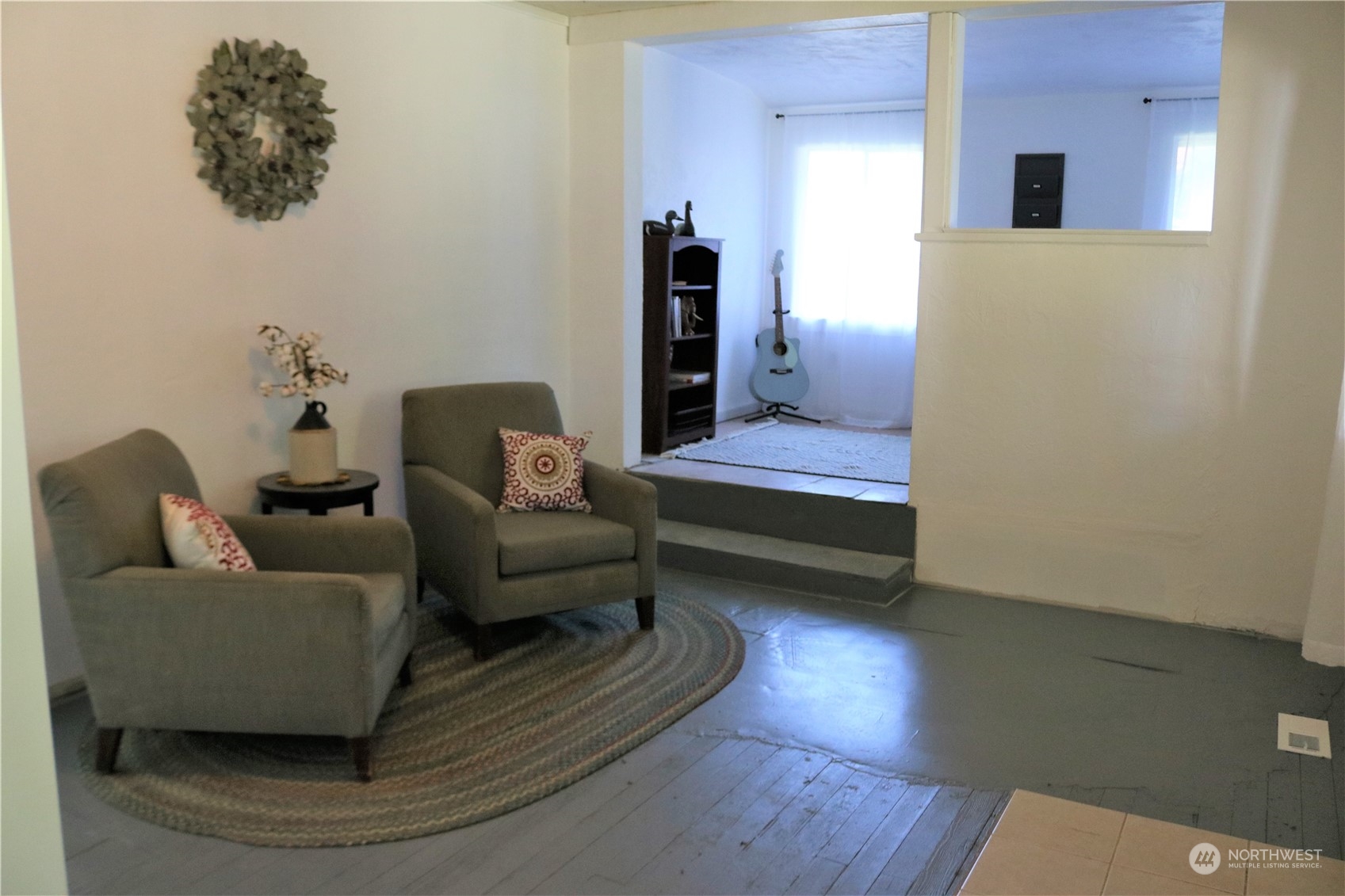 1212 Long Road Centralia, WA 98531 - Photo 34 of 40 a living room with furniture and a wooden floor
